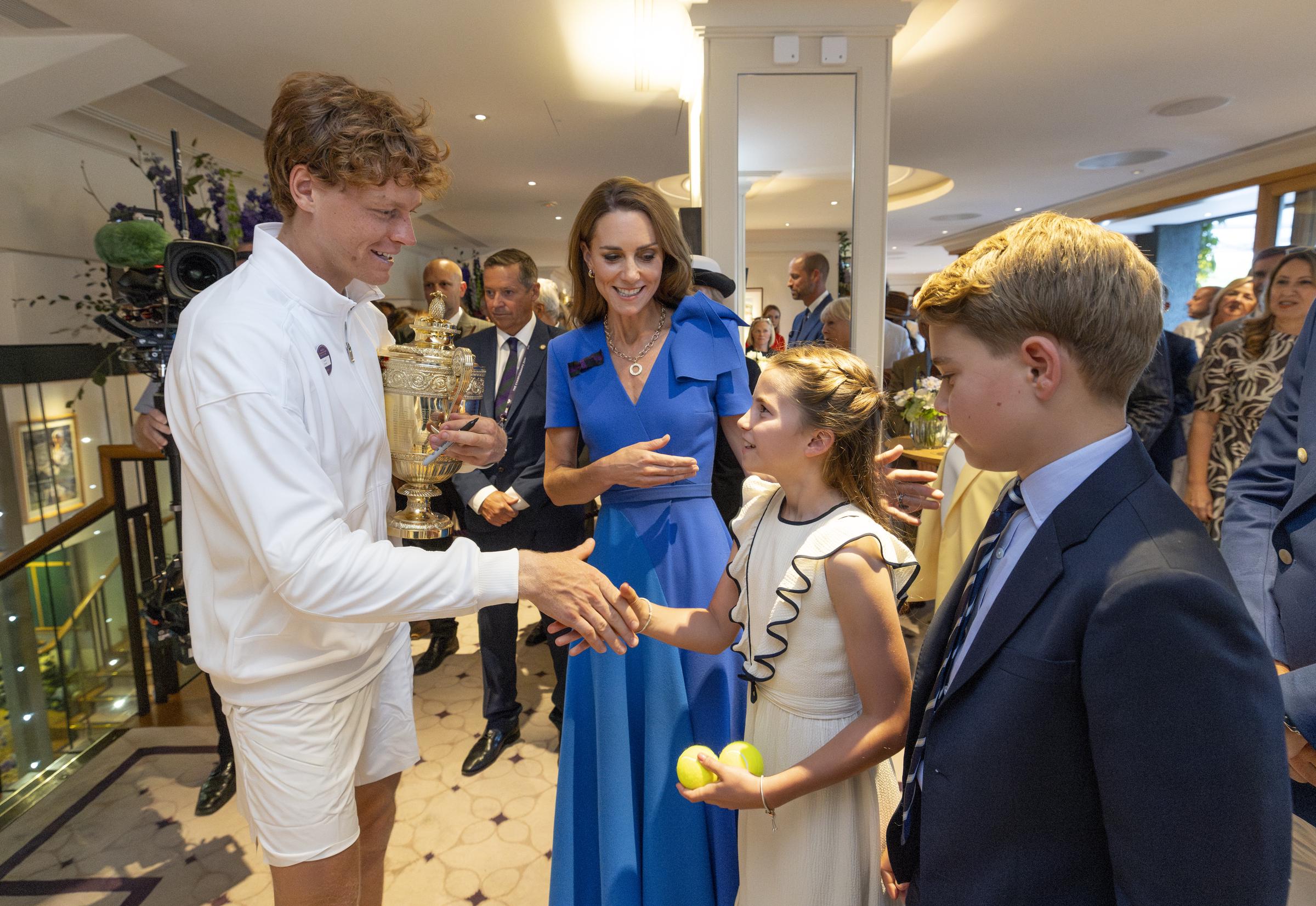 Jannik Sinner of Italy meeting Princess Charlotte and Prince George alongside Catherine, Princess of Wales, during The Wimbledon Championships 2025 at the All England Lawn Tennis and Croquet Club on July 13 in London. | Source: Getty Images
