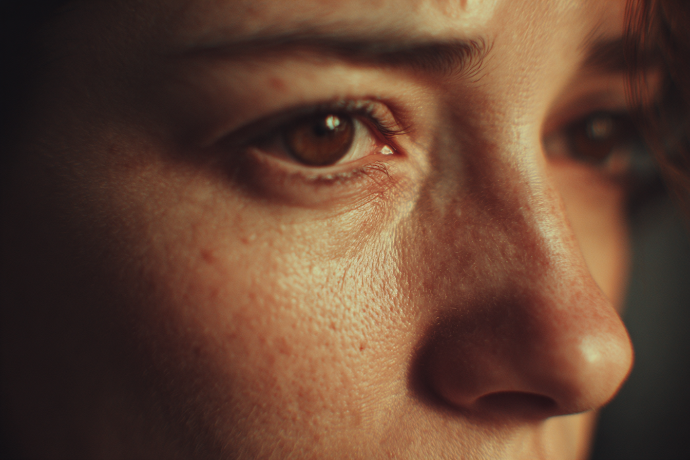 A close-up shot of a woman's face | Source: No source