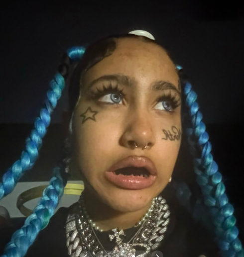 North West showing off her blackened teeth, posted on October 21, 2025. | Source: TikTok/@kimandnorth