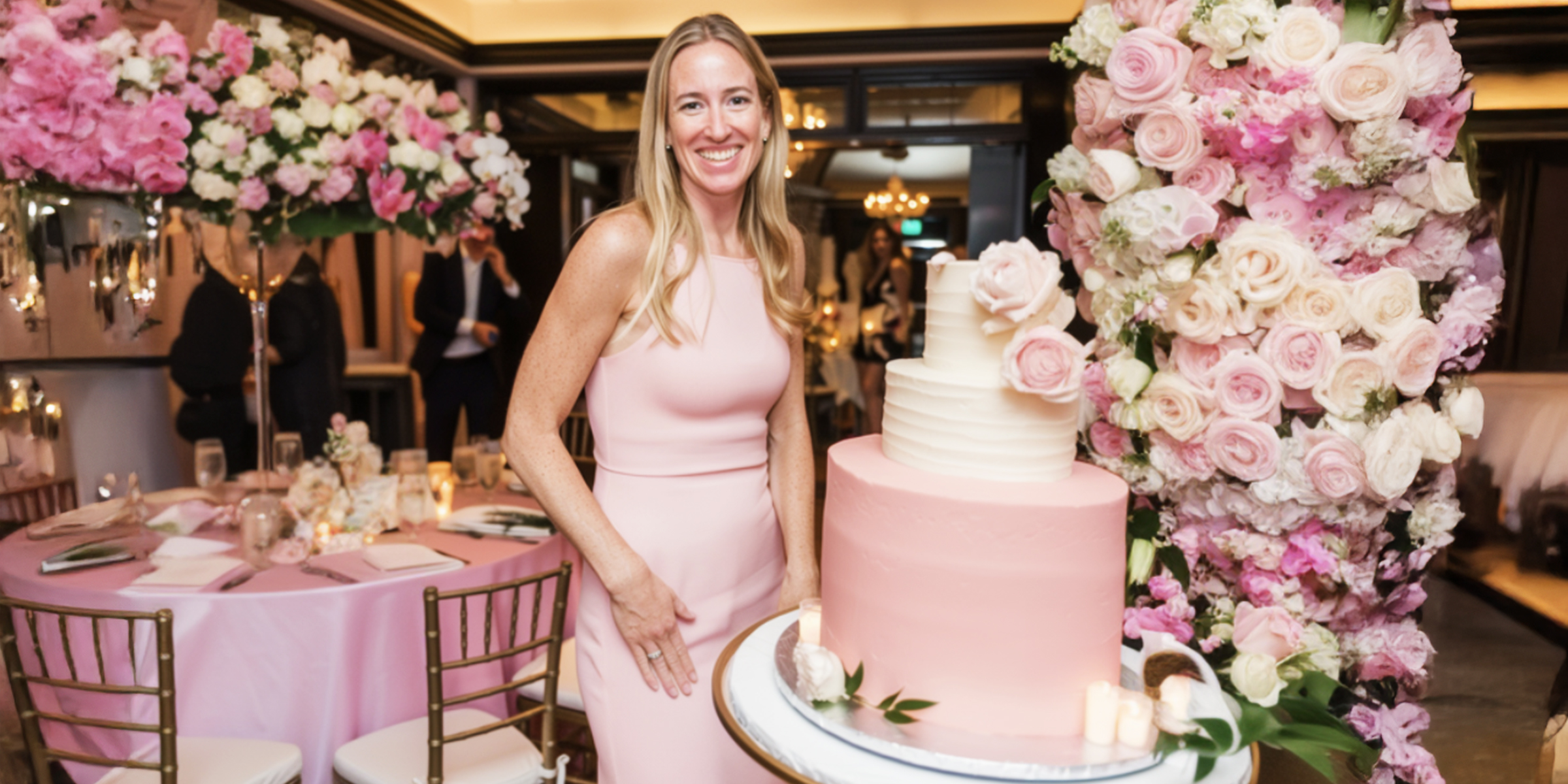 A woman standing next to a cake | Source: No source
