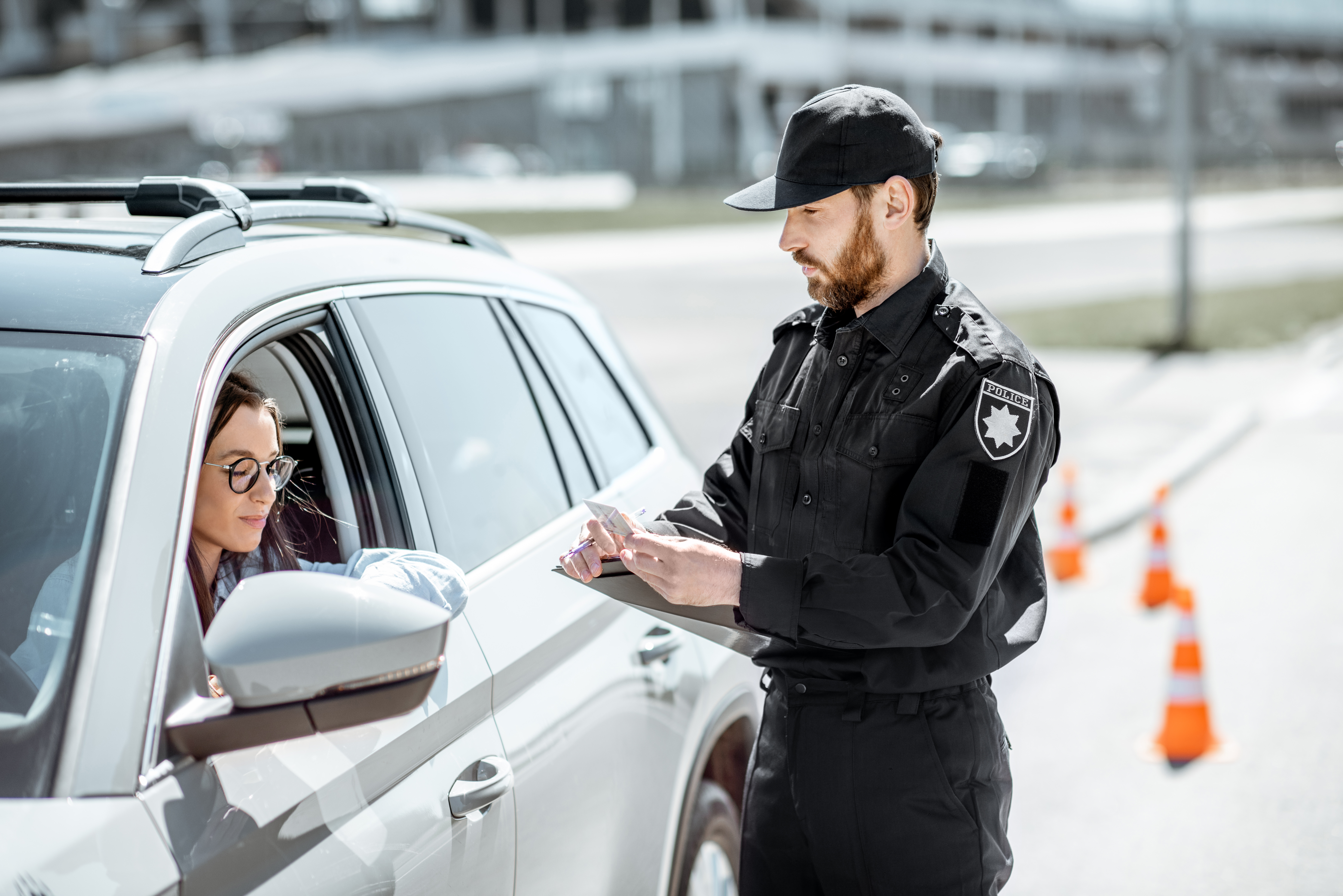 Police near the car | Source: Shutterstock