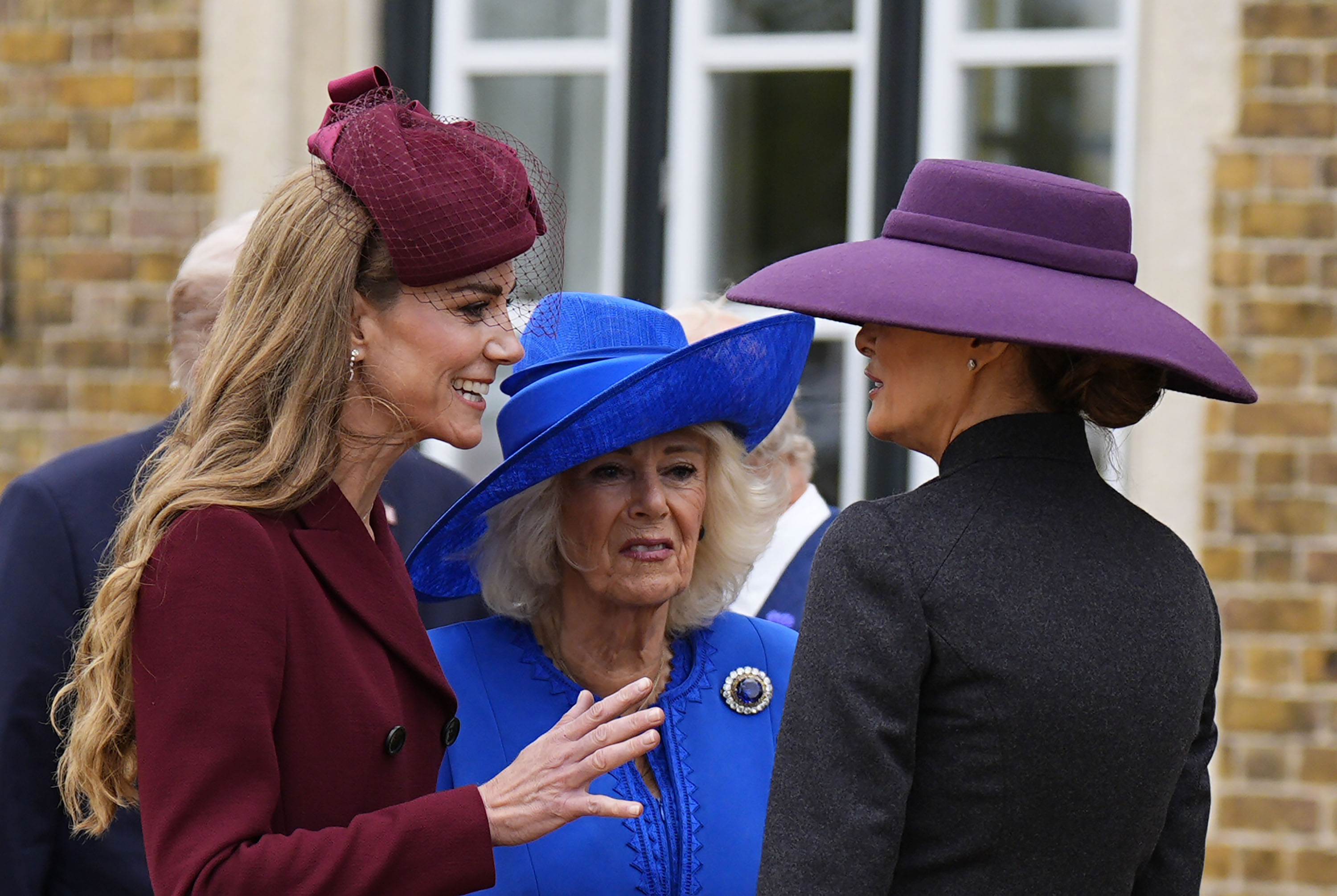 Catherine, Princess of Wales, Queen Camilla and First Lady Melania Trump interact at Windsor Castle in England on September 17, 2025 | Source: Getty Images