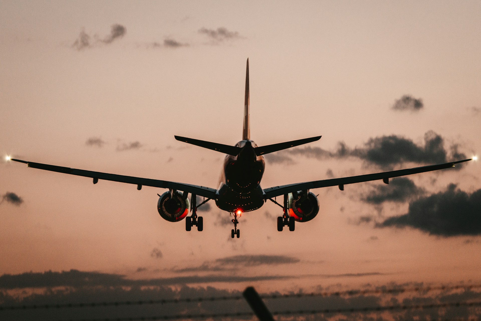 An airplane on the verge of landing | Source: Unsplash