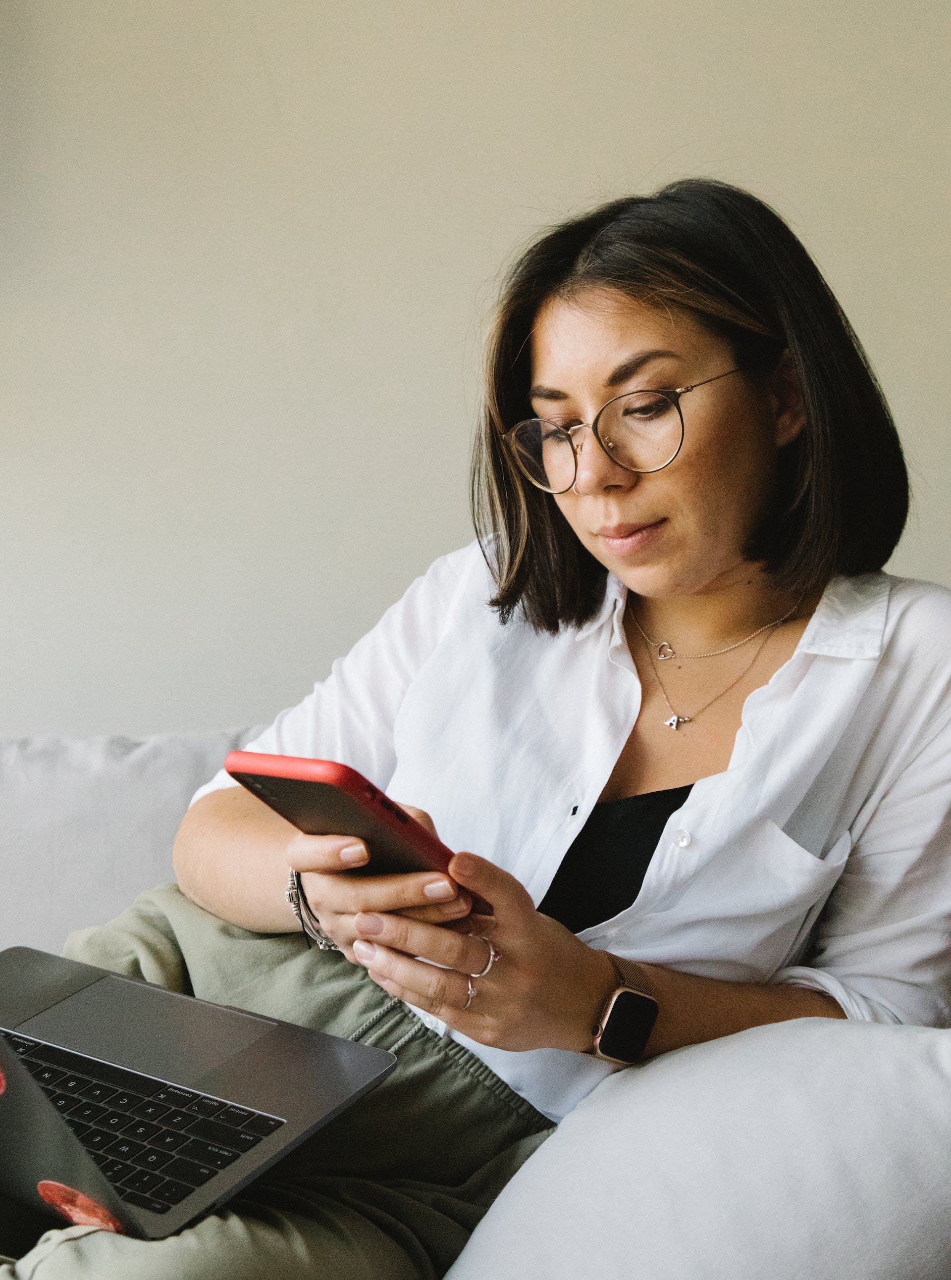 A woman checking her phone | Source: Pexels