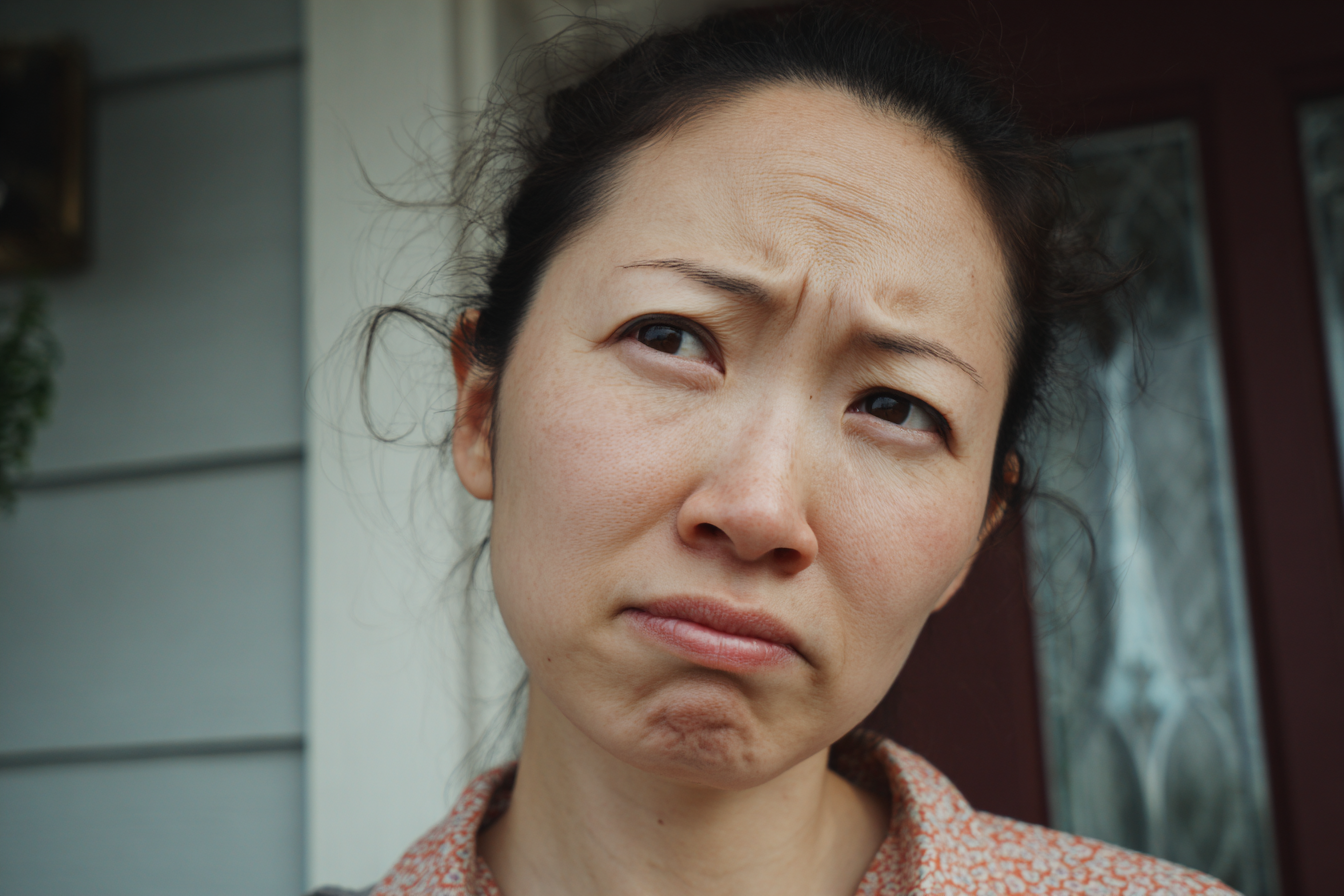 A woman frowning at someone | Source: No source