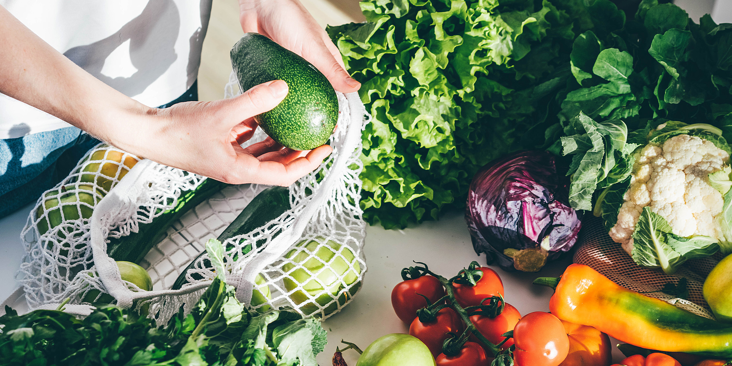 Vegetables scattered on a counter | Source: Getty Images