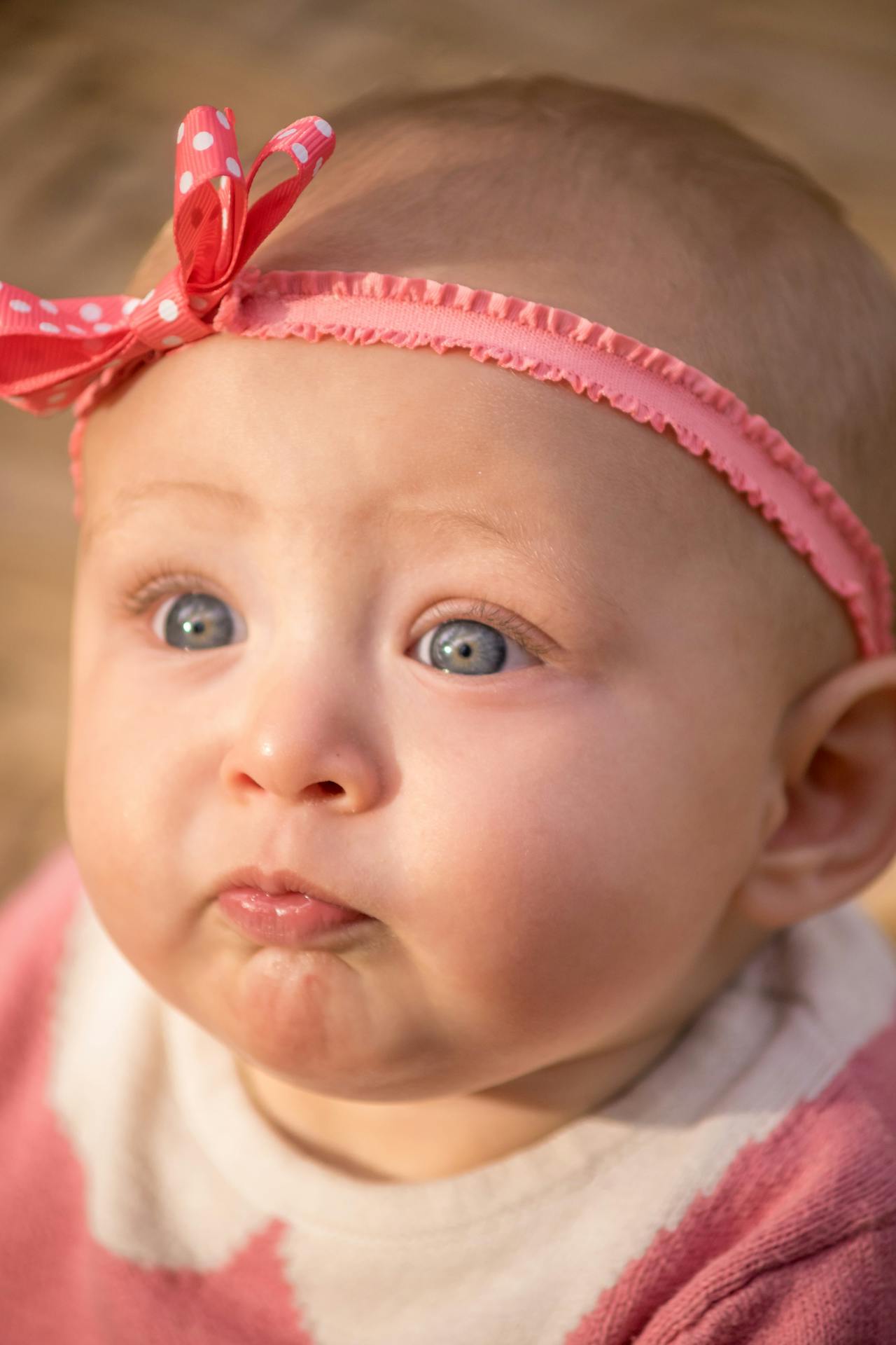 Close-up shot of a baby girl | Source: Pexels