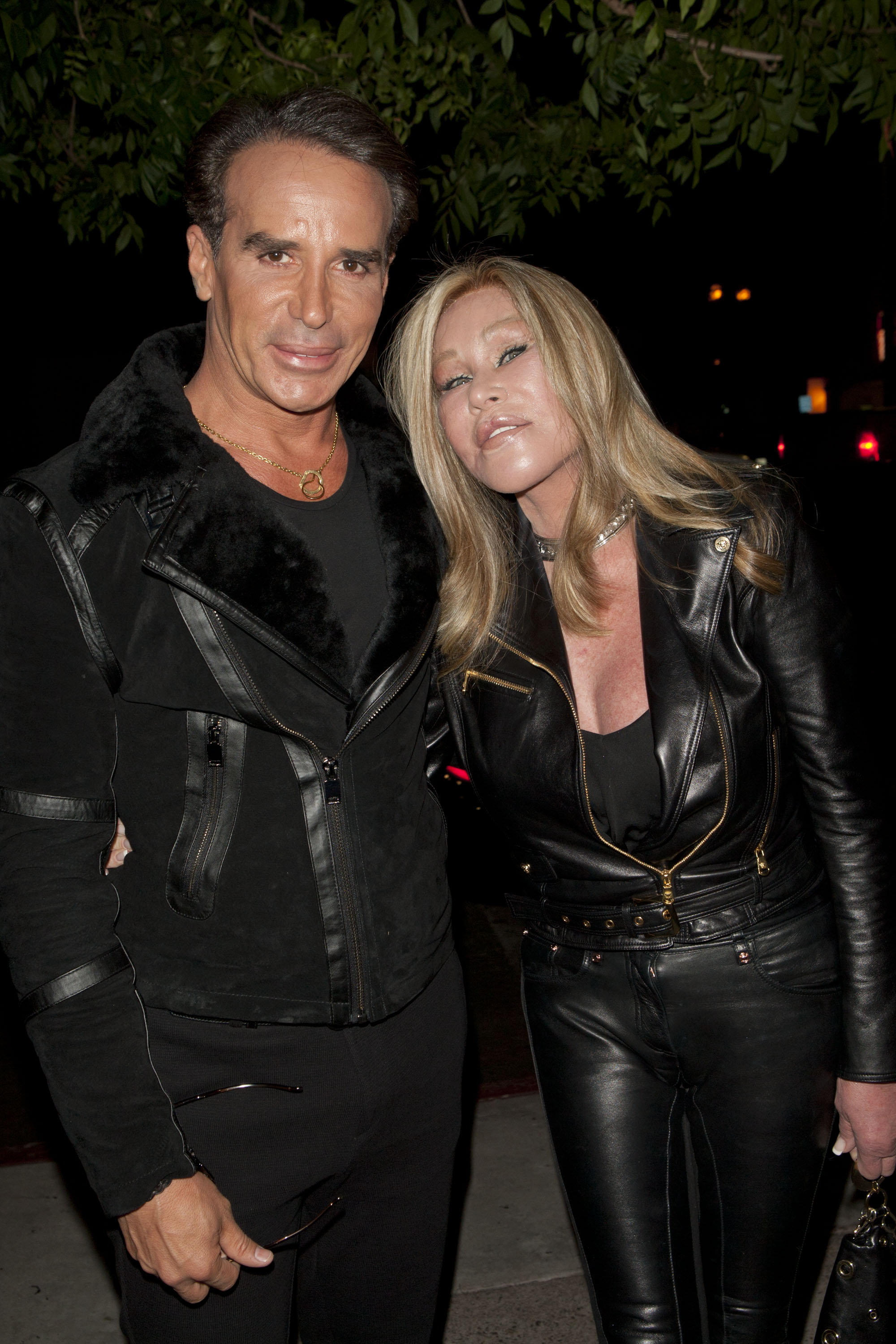 Jocelyne Wildenstein was photographed with a distinctly shiny facial texture, wide eyes, and an open-mouthed expression that stretched her already full lips, while attending the Bungalo Universal Recording Artist Mohammad's Debut Showcase featuring Lloyd Klein on September 18, 2013, in Los Angeles, California.