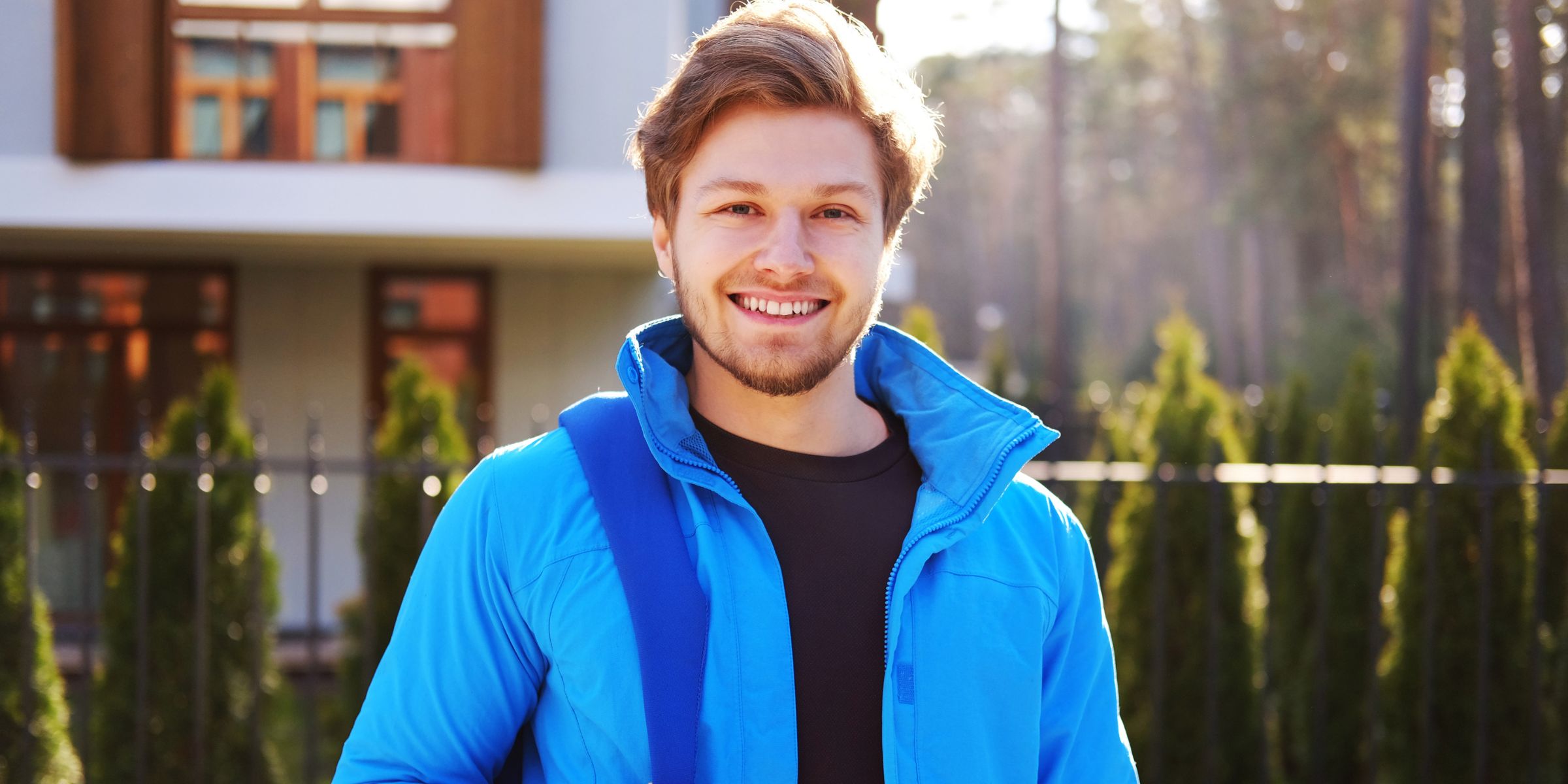 A smiling young man | Source: Freepik