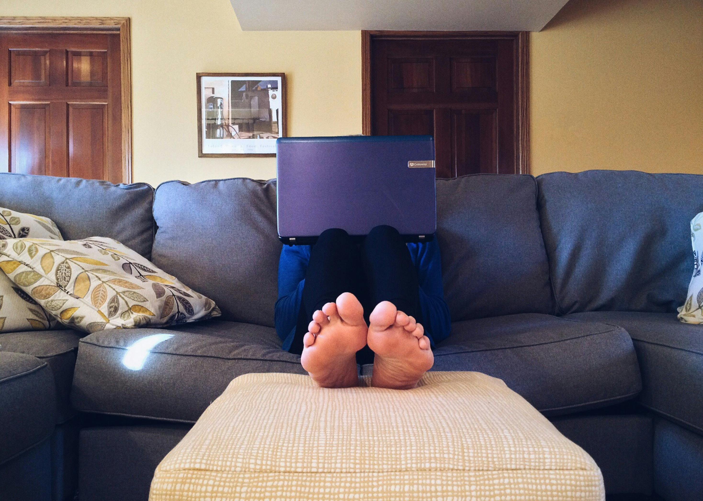 Laptop blocking a person's face | Source: Pexels