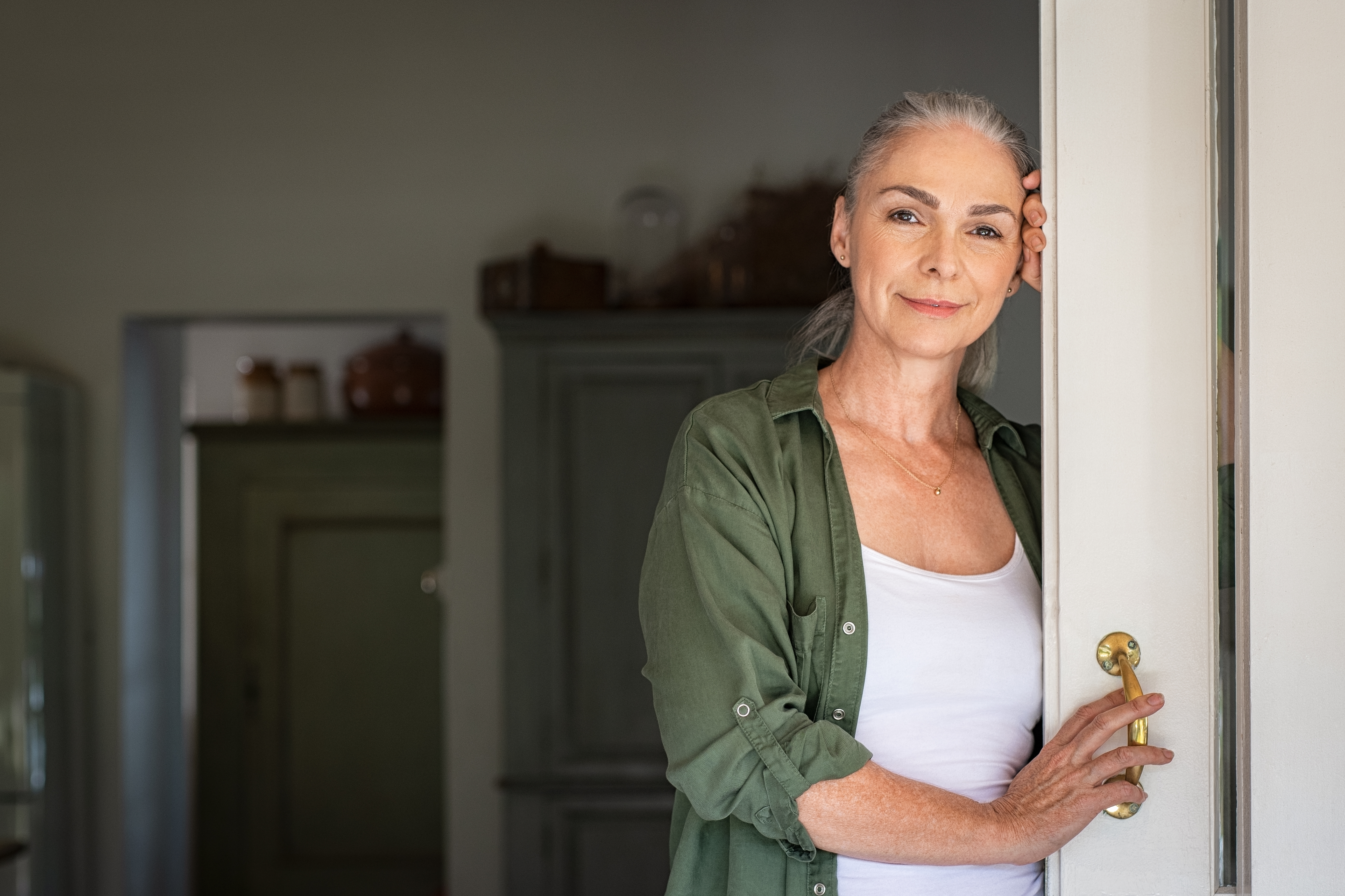 Woman in a doorway | Source: Shutterstock