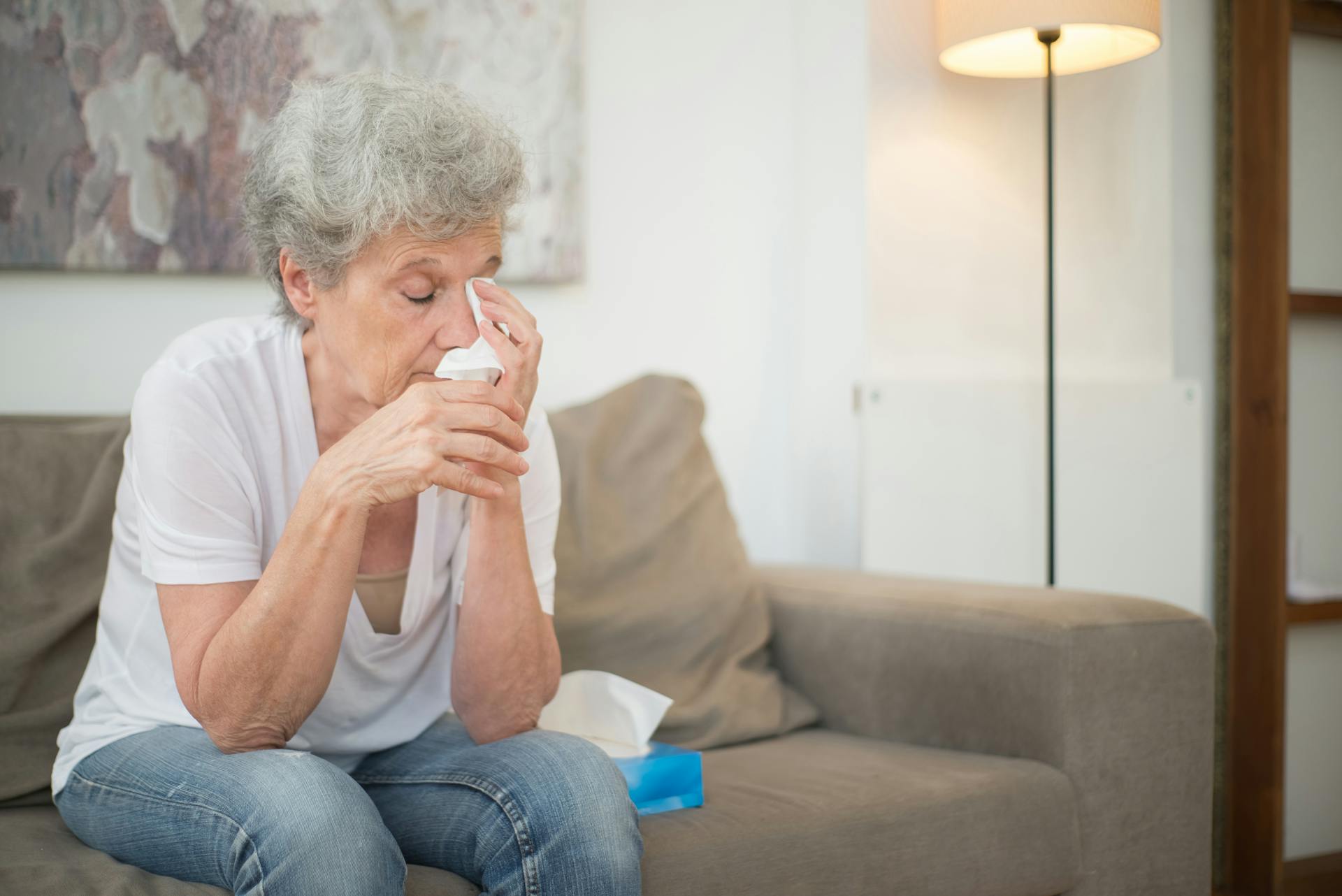 A senior woman wiping her tears | Source: Pexels