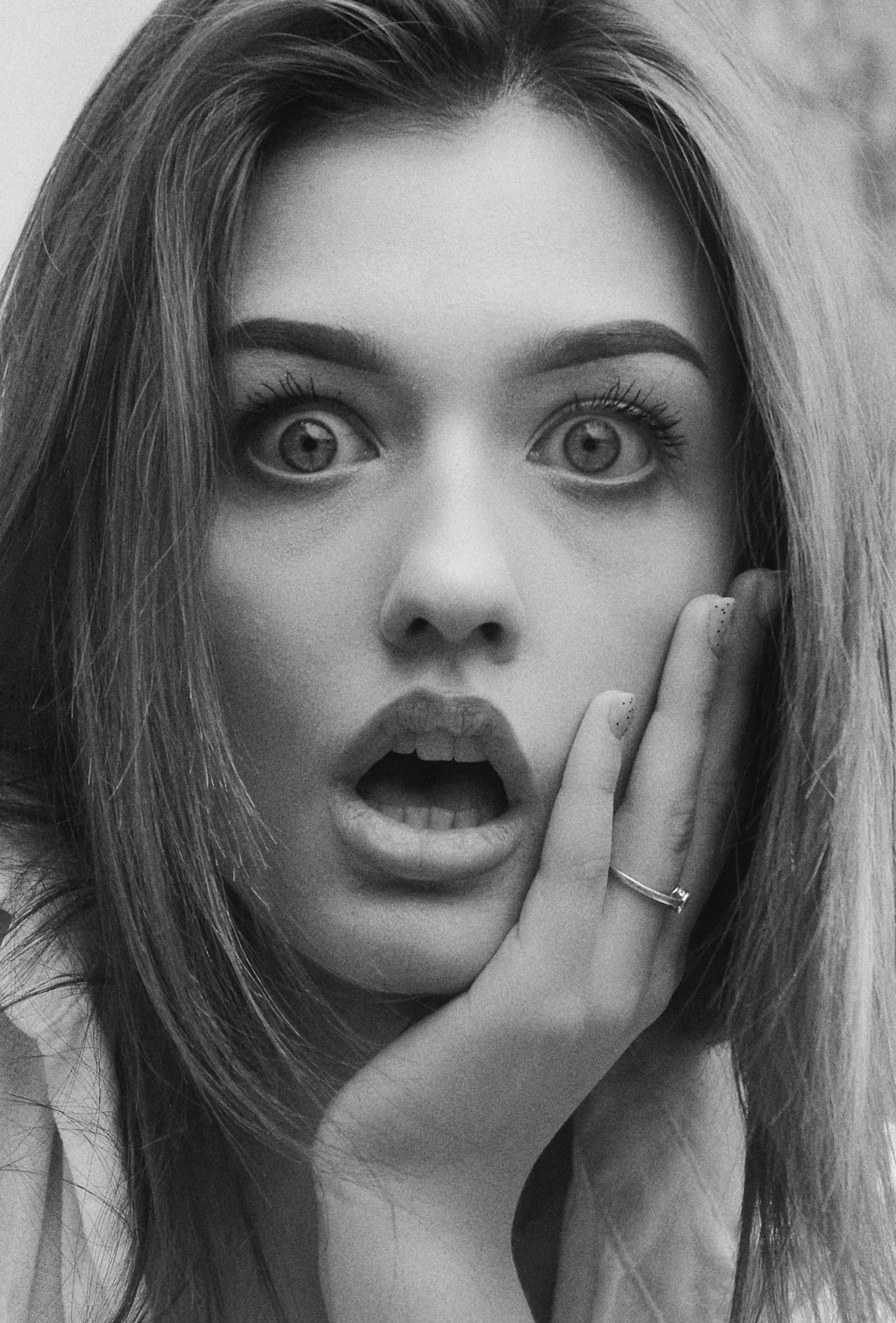Grayscale picture of a shocked woman | Source: Pexels