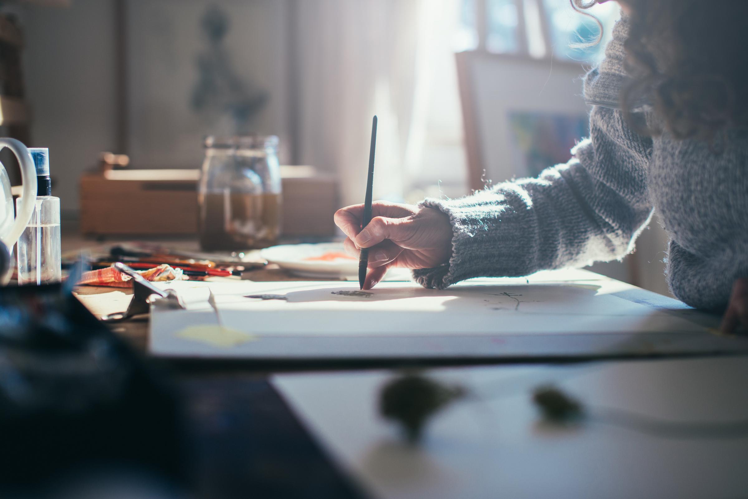 A woman making a watercolor painting | Source: Getty Images
