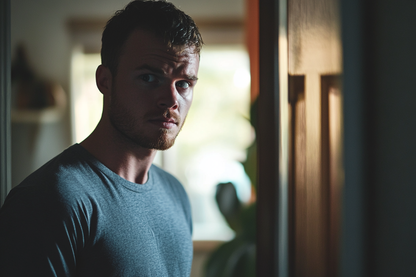 A frowning man in a house | Source:  No source