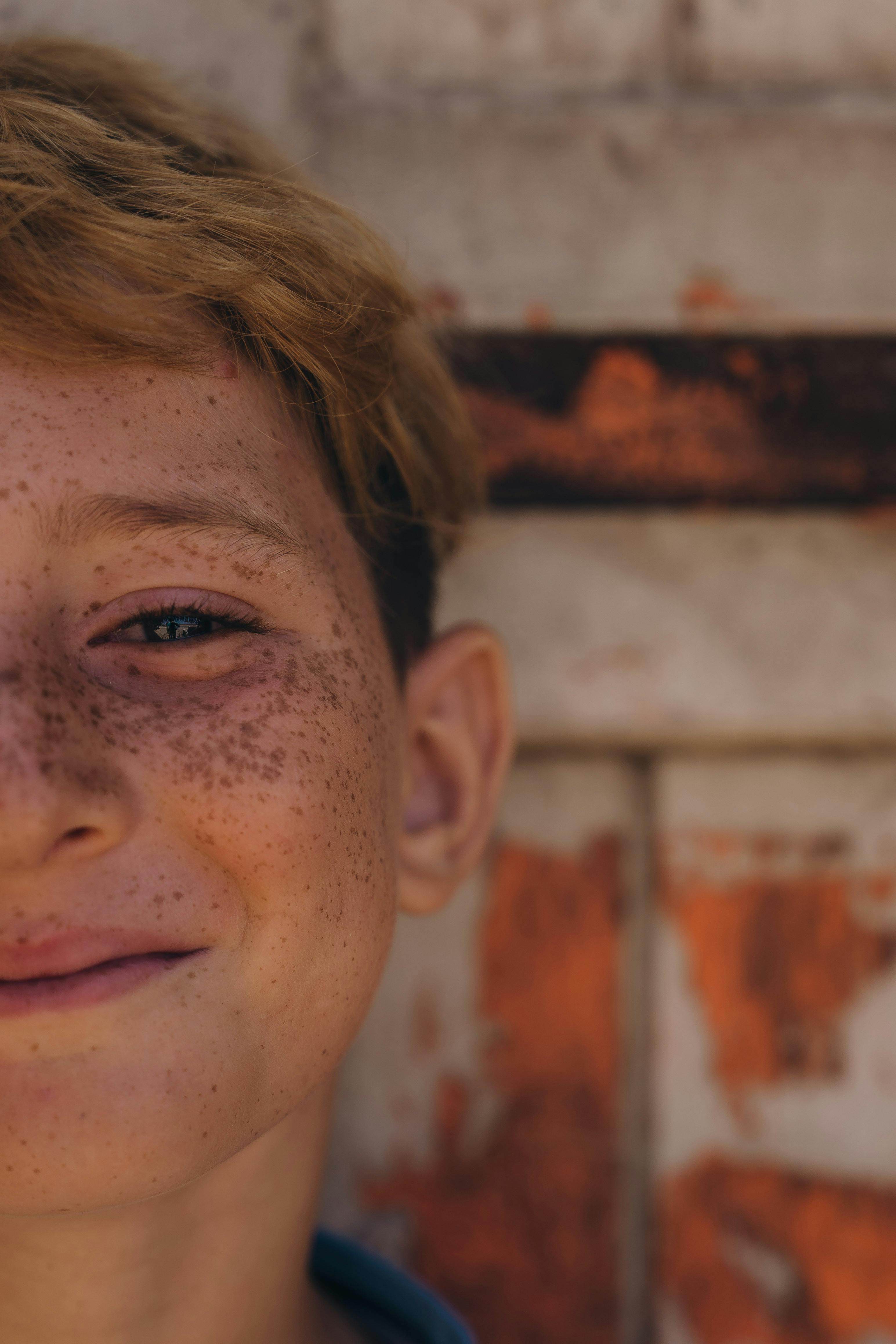 Portrait of freckled boy close-up