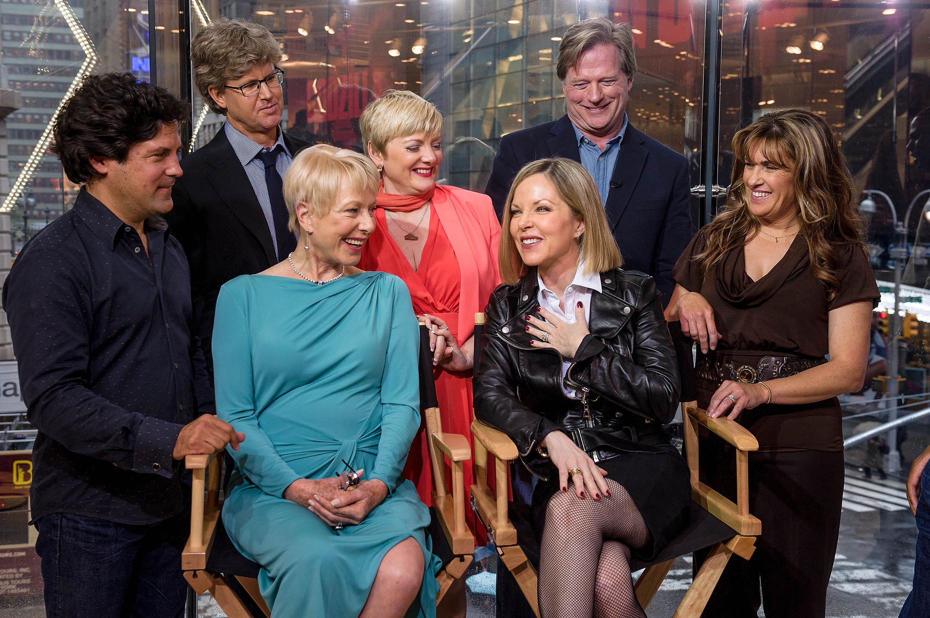 Matthew Labyorteaux, Michael Landon Jr., Alison Arngrim, Dean Butler, Lindsay Greenbush, (L-R seated) Karen Grassle, and Melissa Sue Anderson visit "Extra" at their New York studios on April 30, 2014 | Source: Getty Images