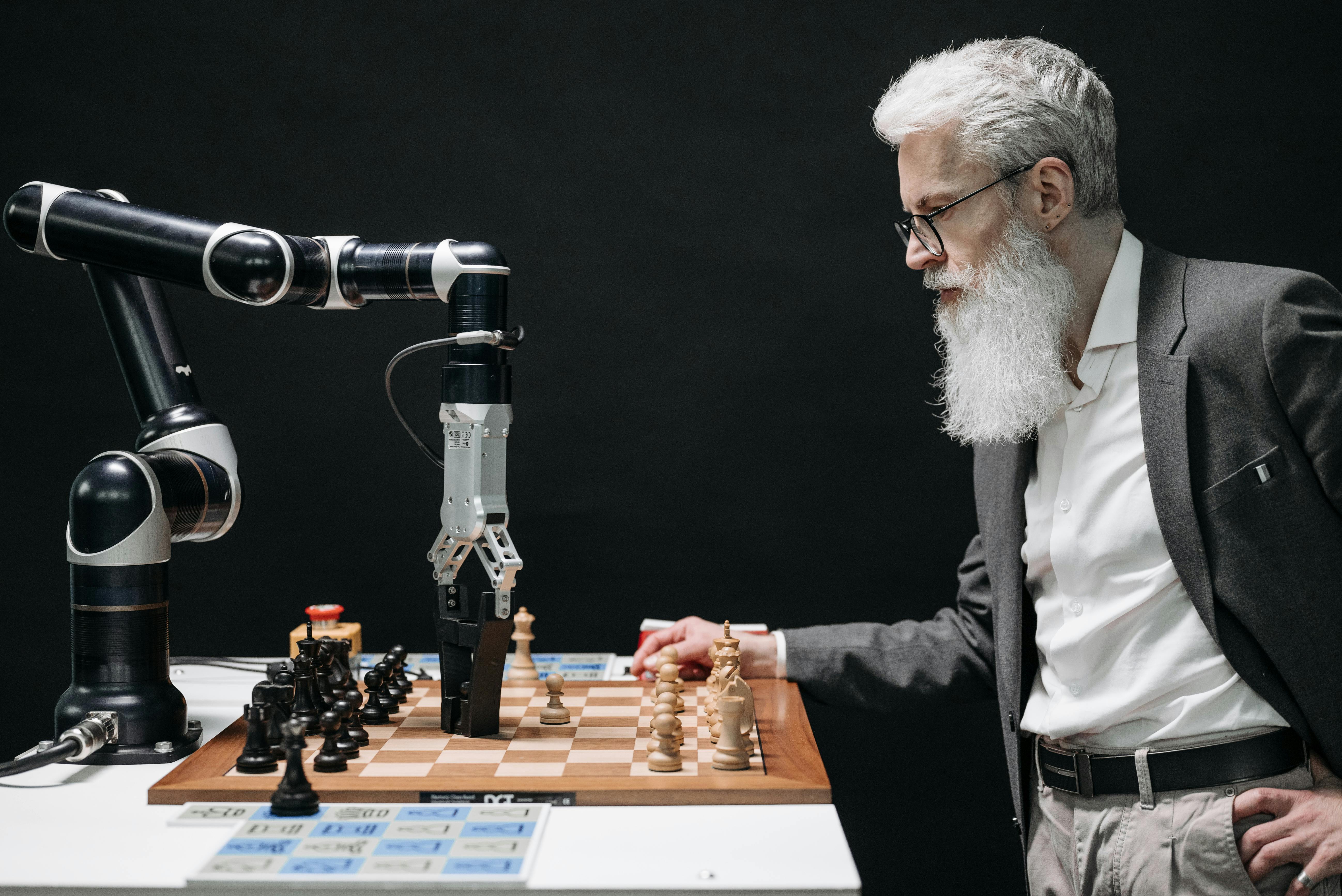Man plays chess with robot | Source: Pexels