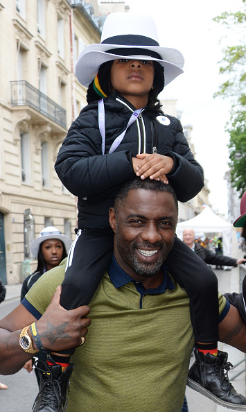 Idris Elba poses with son Winston Elba on his shoulders at the ABB FIA Formula E Qatar Airways Paris E-Prix 2018 in France on April 28. | Source: Getty Images