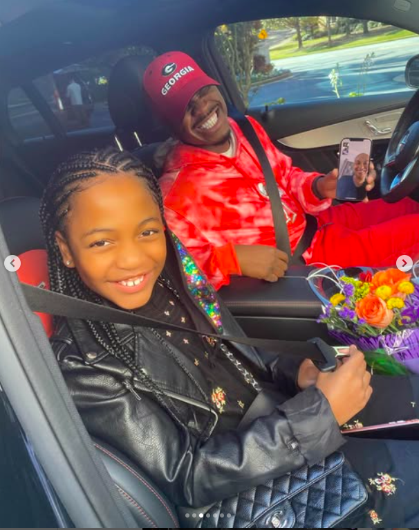 Madilyn Shaw-Smith smiling for a photo with her dad, Ne-Yo, during a daddy-daughter date, posted on November 21, 2020. | Source: Instagram/masoandmadi