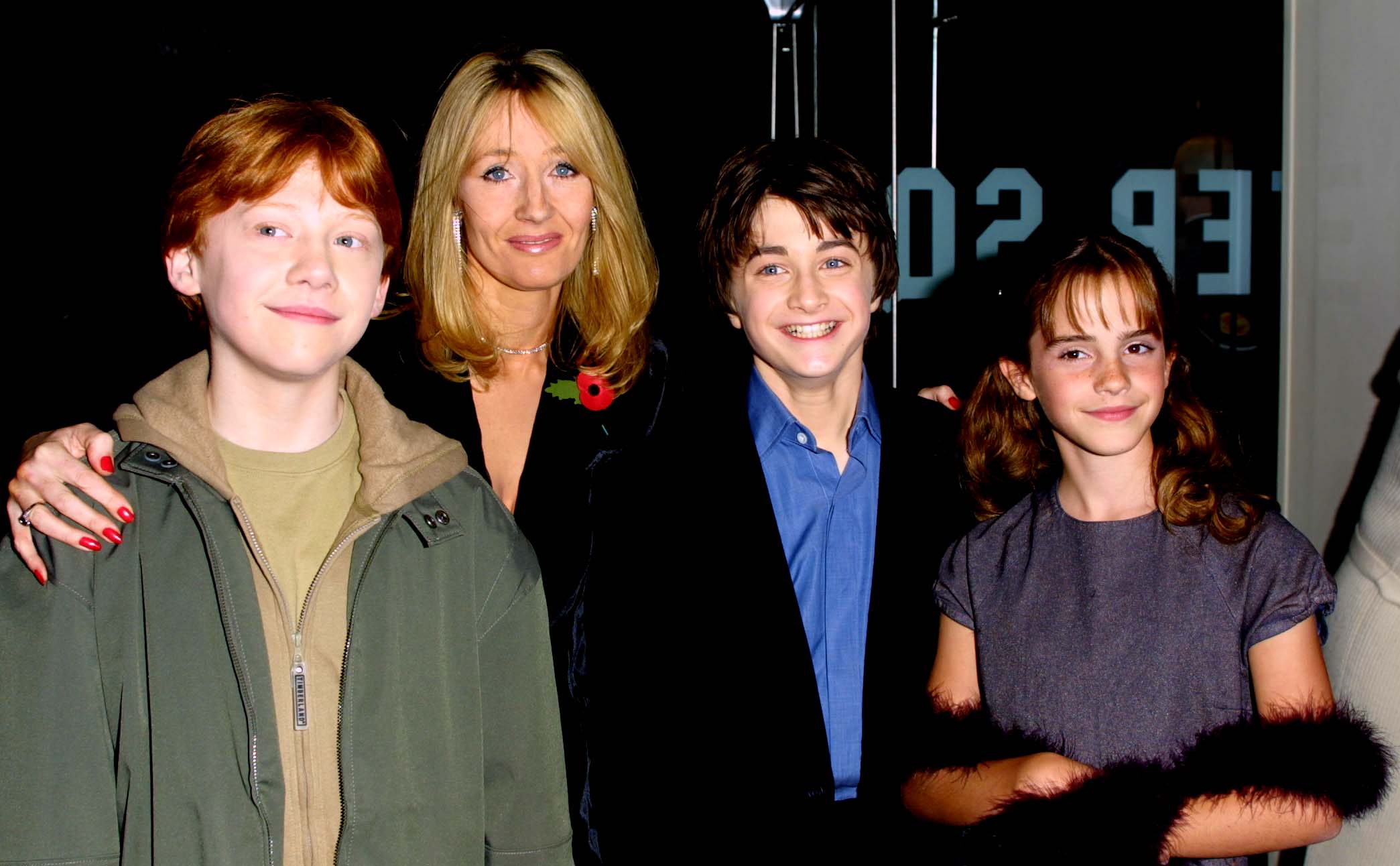 Rupert Grint, JK Rowling, Daniel Radcliffe and Emma Watson attend the world premiere of 'Harry Potter and the Philosopher's Stone' at the Odeon Leicester Square, London, on November 4, 2001. | Source: Getty Images