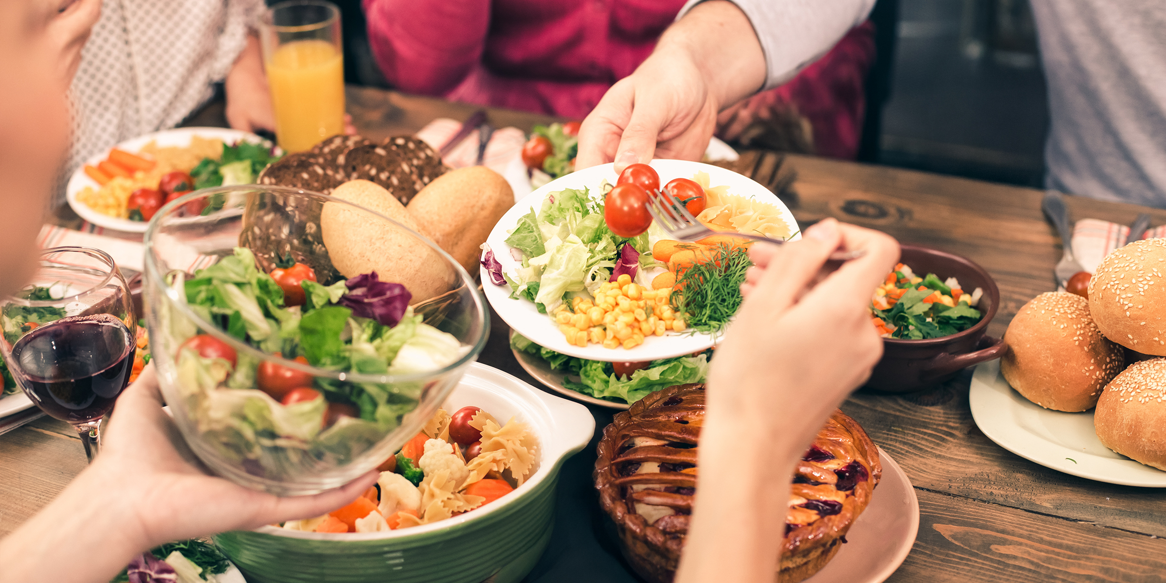 A variety of dishes laid out for a family meal | Source: Shutterstock