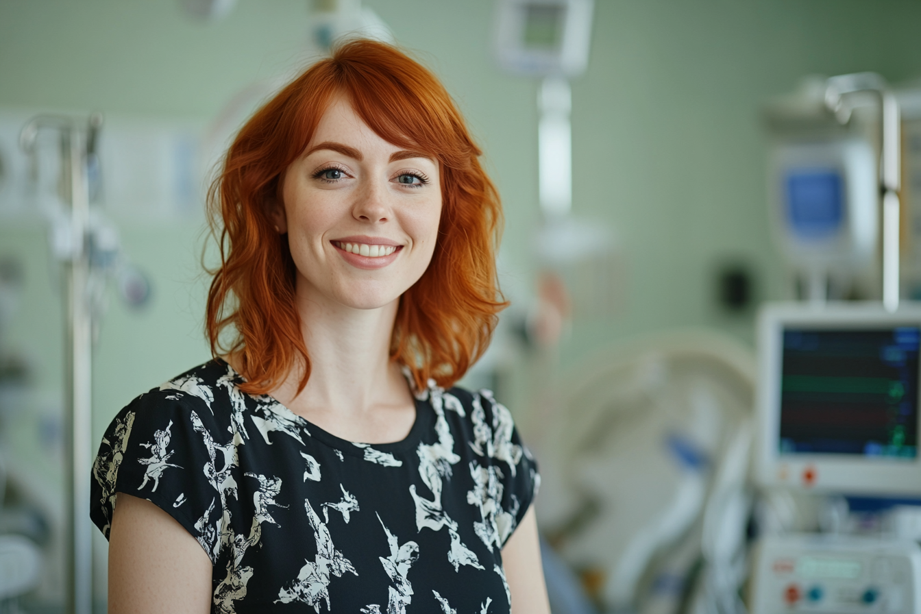A smiling woman in a hospital room | Source: no source