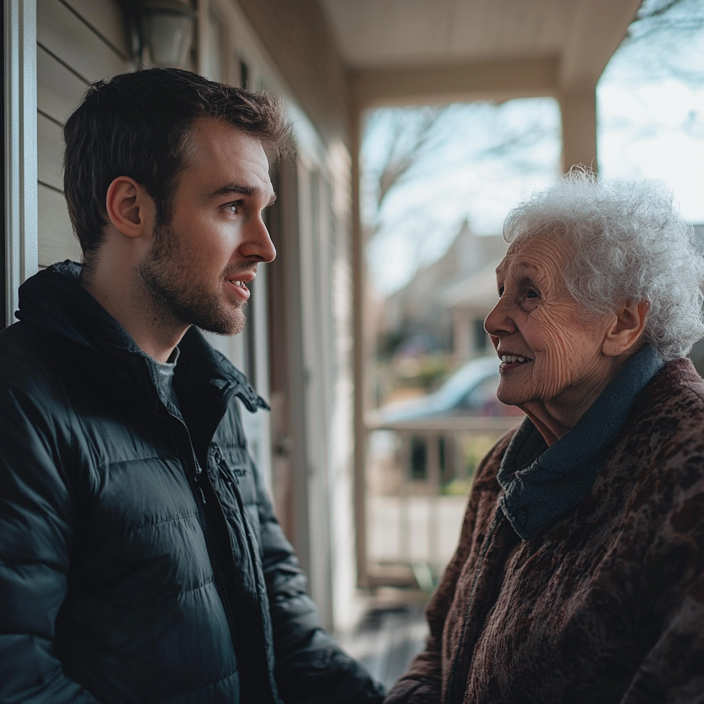 A man talking to his neighbor on his porch | Source: no source