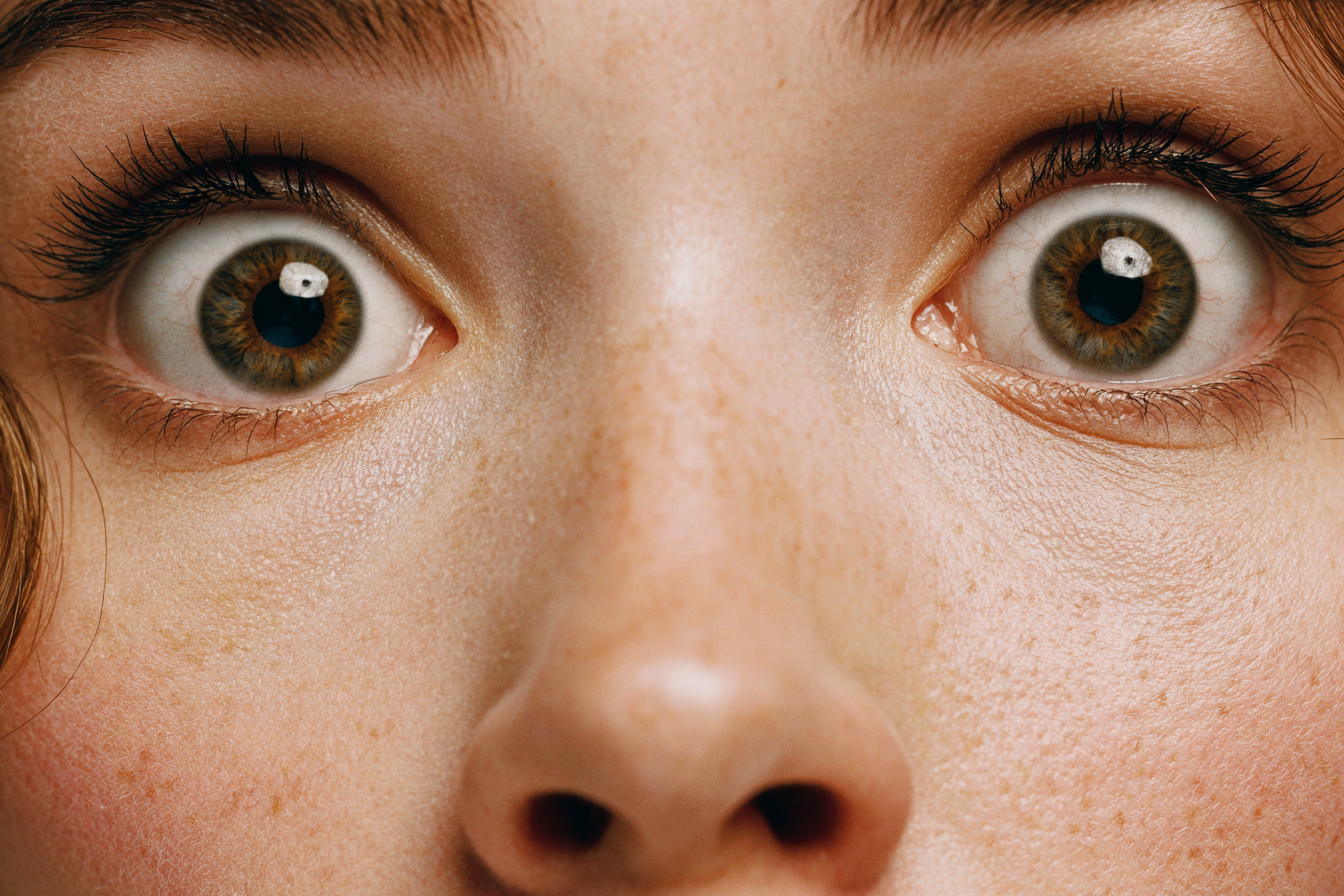 A close-up shot of a woman's face | Source: no source