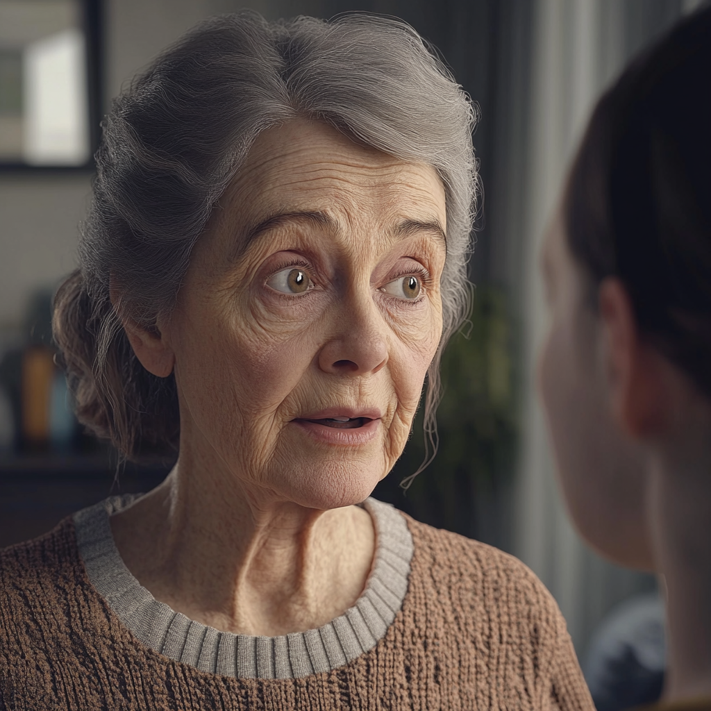 A woman talking to her granddaughter | Source: No source