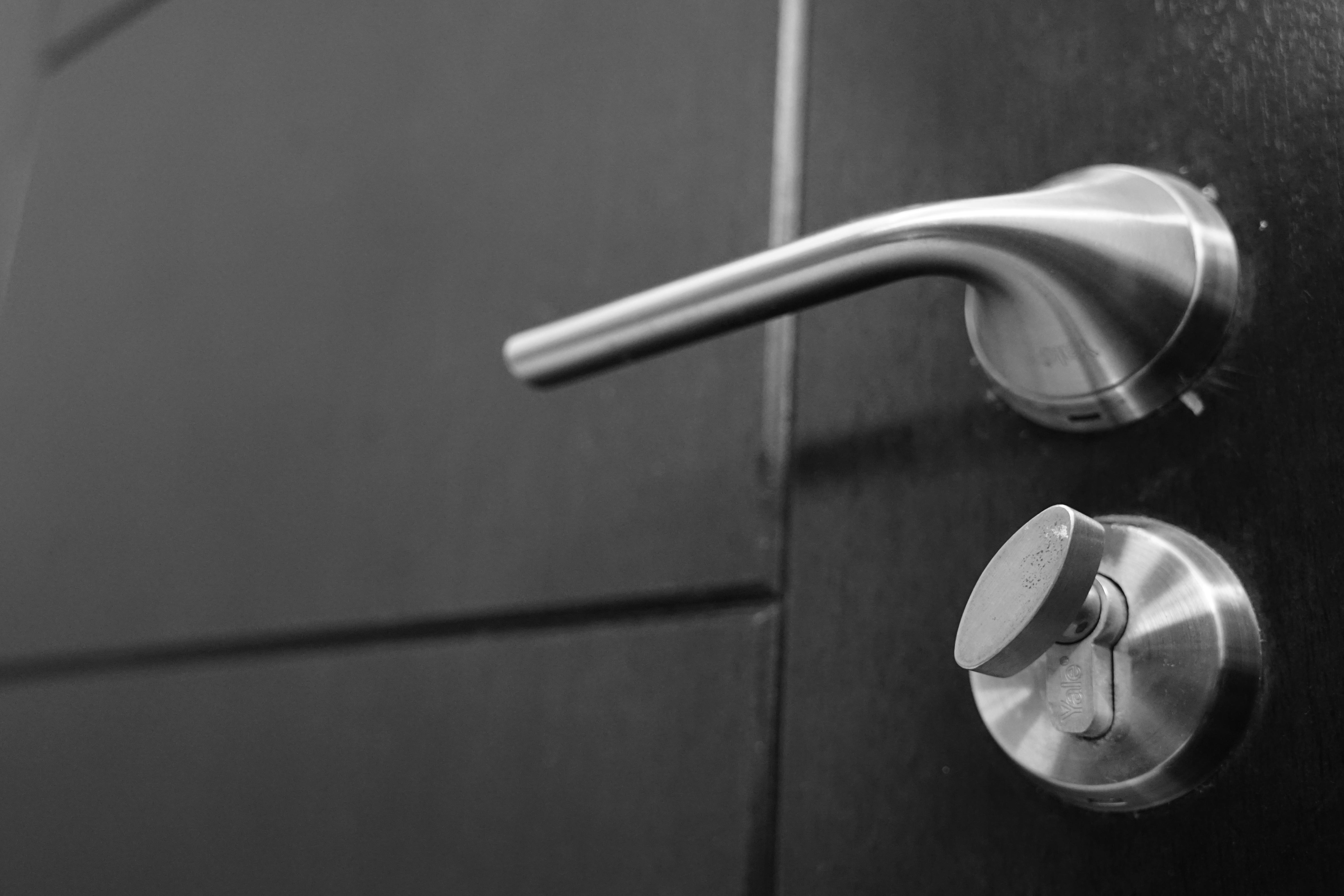 Stainless steel door lever and lock | Source: Pexels