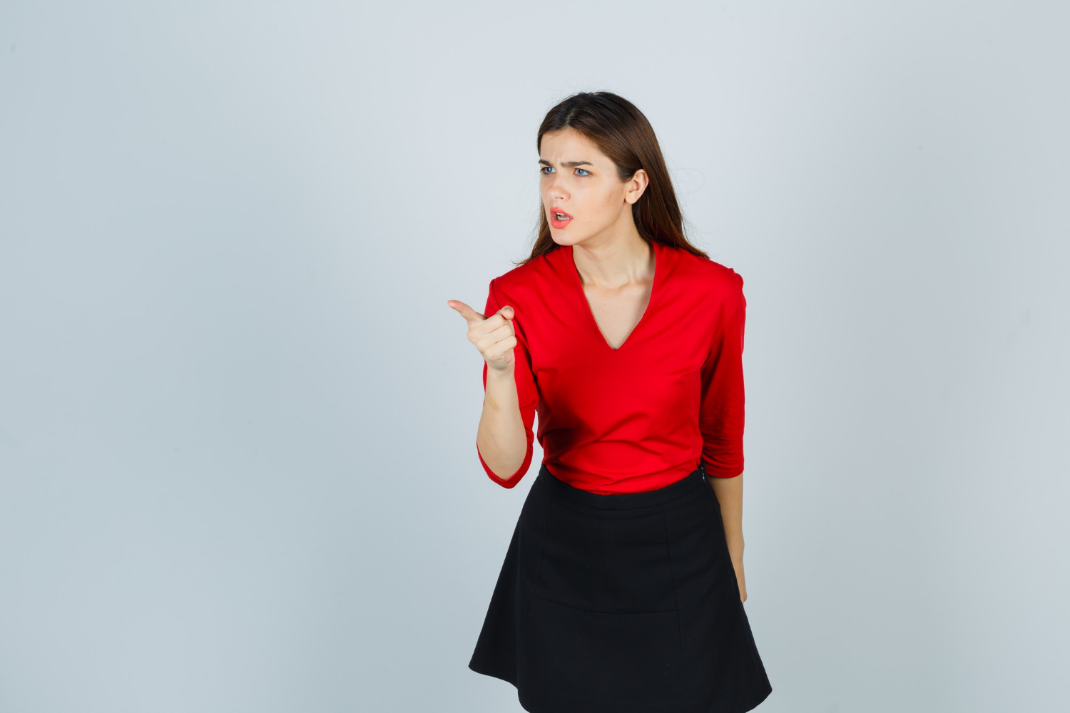 A furious woman arguing | Source: Freepik