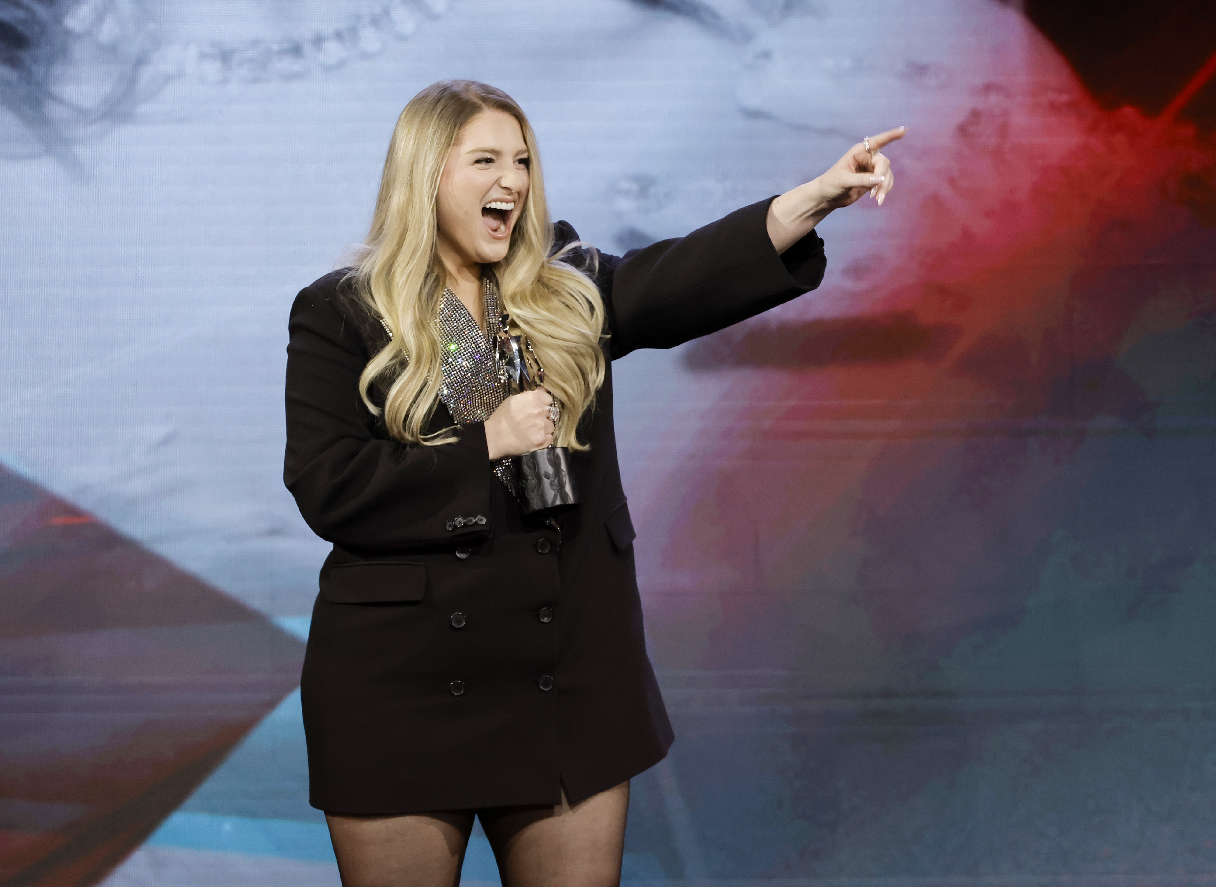 Meghan Trainor, 29, showed a smooth, slightly fuller cheek and jawline contour, a wide-open mouth, while accepting the Rolling Stone Sound of the Year Award onstage during the Streamy Awards on August 27, 2023, in Los Angeles, California.