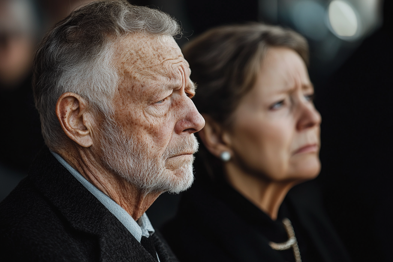 A mature couple at a funeral reception | Source: No source