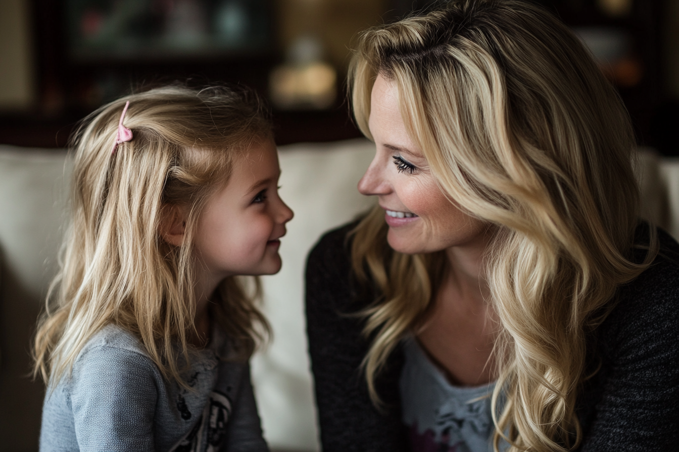 A woman smiling at her daughter | Source: No source