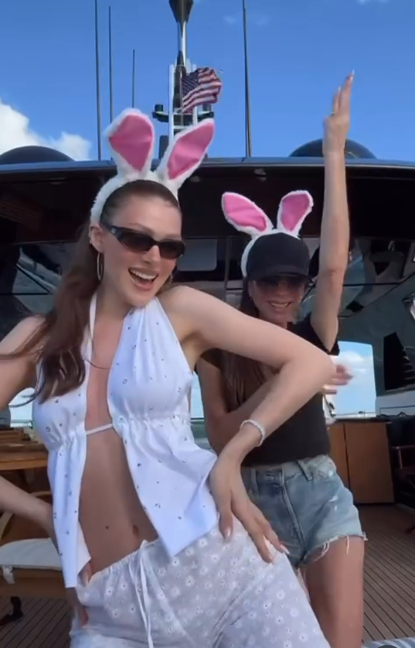 Victoria Beckham and Nicola Peltz dance together in bunny ears for Easter on a yacht in a post dated March 30, 2024 | Source: Instagram/victoriabeckham