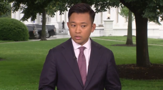 Aaron Navarro hears gunshots mid-broadcast at the White House on May 23, 2026. | Source: X/ThePremium24X