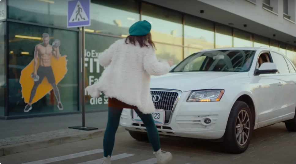 Sleek white car approaching in woman's direction | Source: LOVEBUSTER