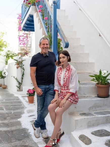 "Emily in Paris" creator Darren Star and Lily Collins bid farewell to "Emily in Paris" in this image from a post dated May 21, 2026. | Source: Instagram/emilyinparis