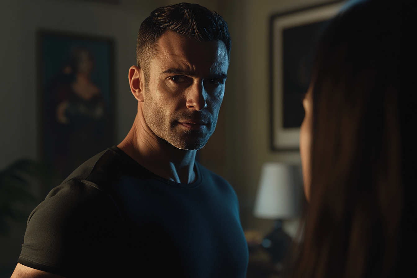 A muscular man looking away while talking to his wife's sister | Source: no source