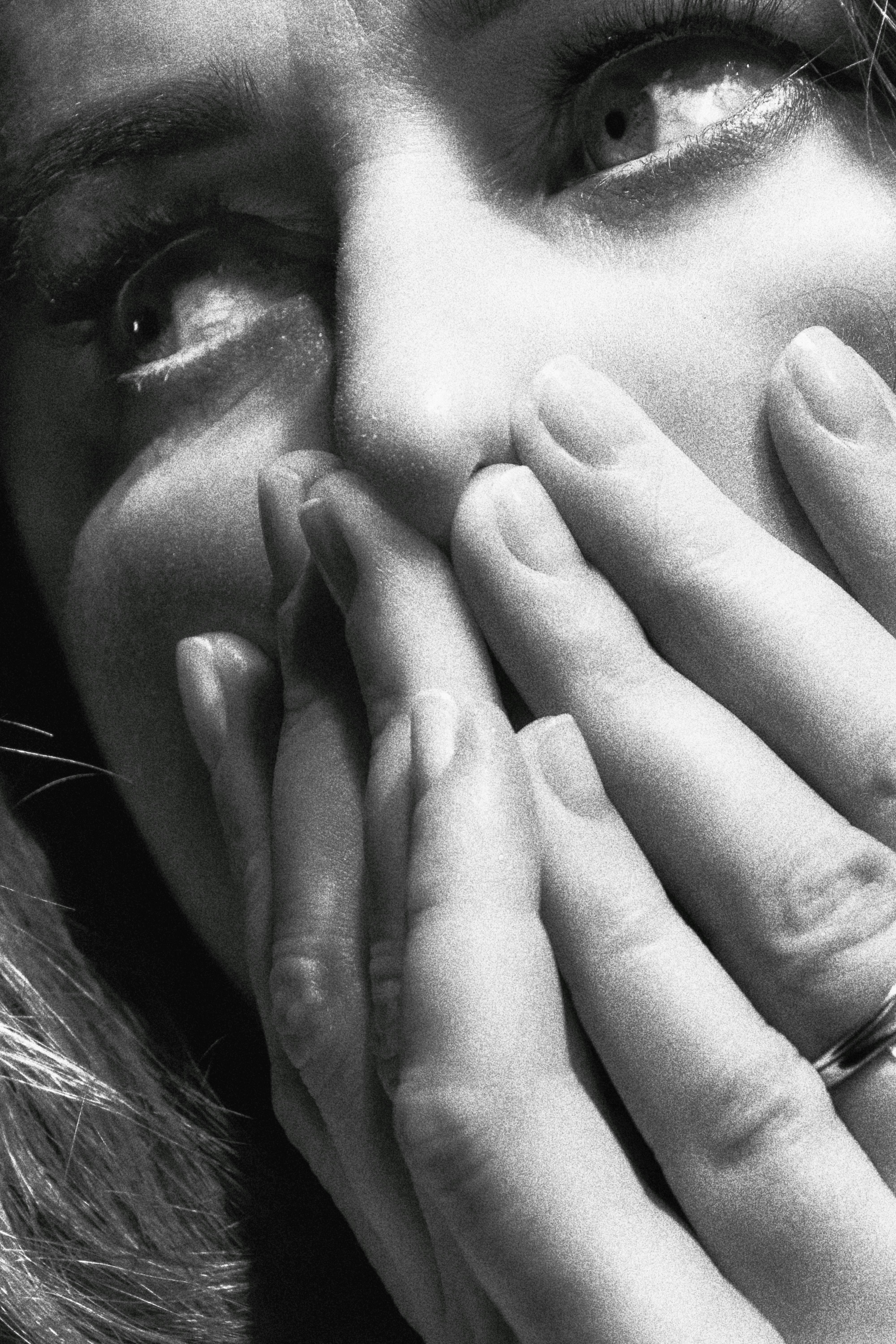 Woman holding hands on her face | Source: Pexels
