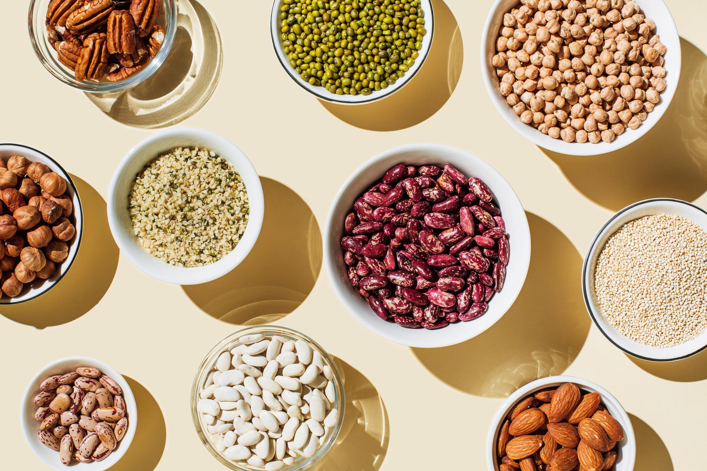 Several bowls of beans and legumes | Source: Getty Images