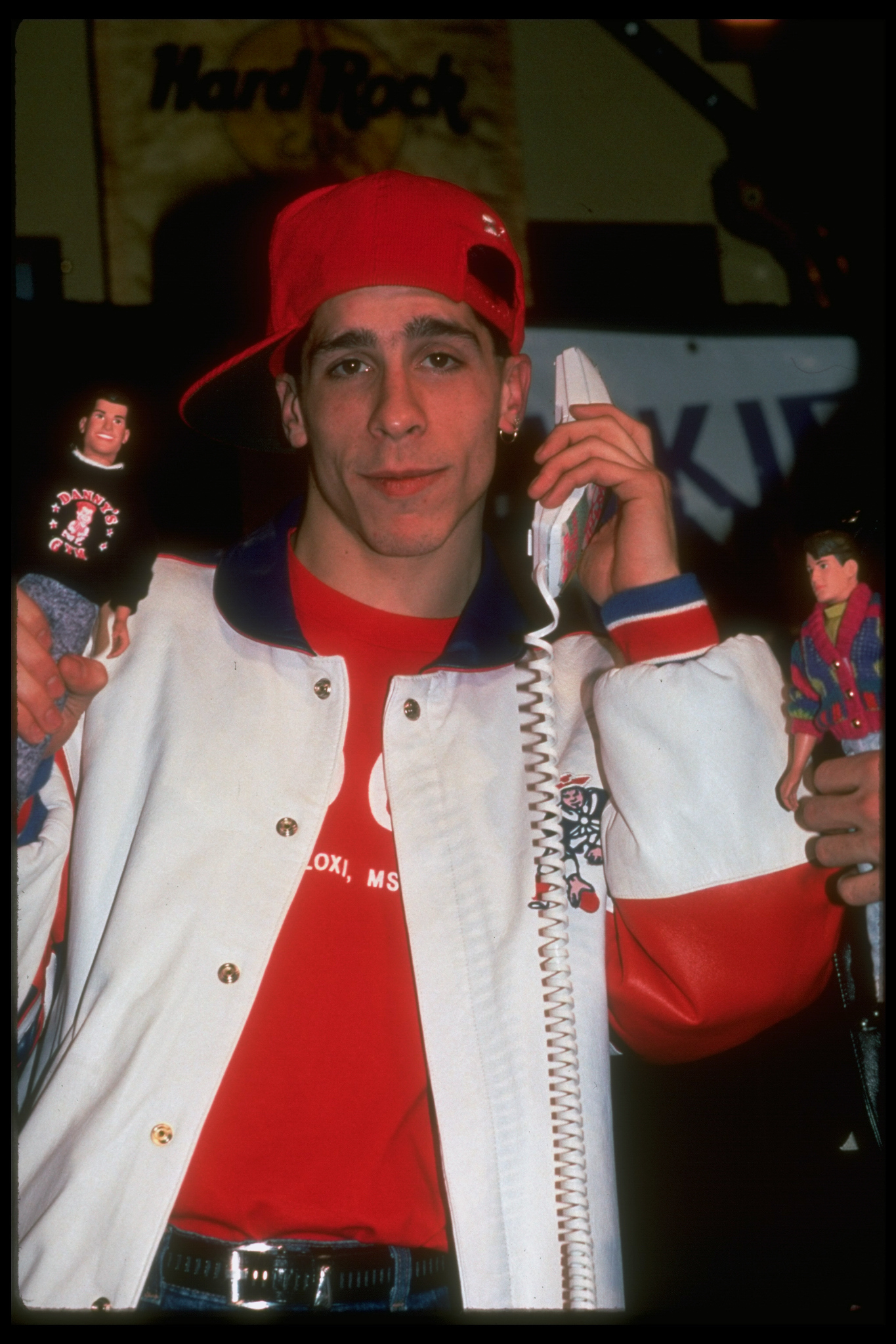 Danny Wood holding a toy version of himself in 1980. | Source: Getty Images