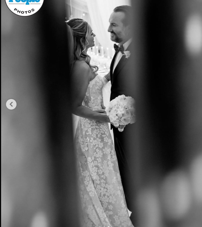 Christine Baumgartner and Josh Connor are pictured during their wedding, dated October 20, 2025 | Source: Instagram/people