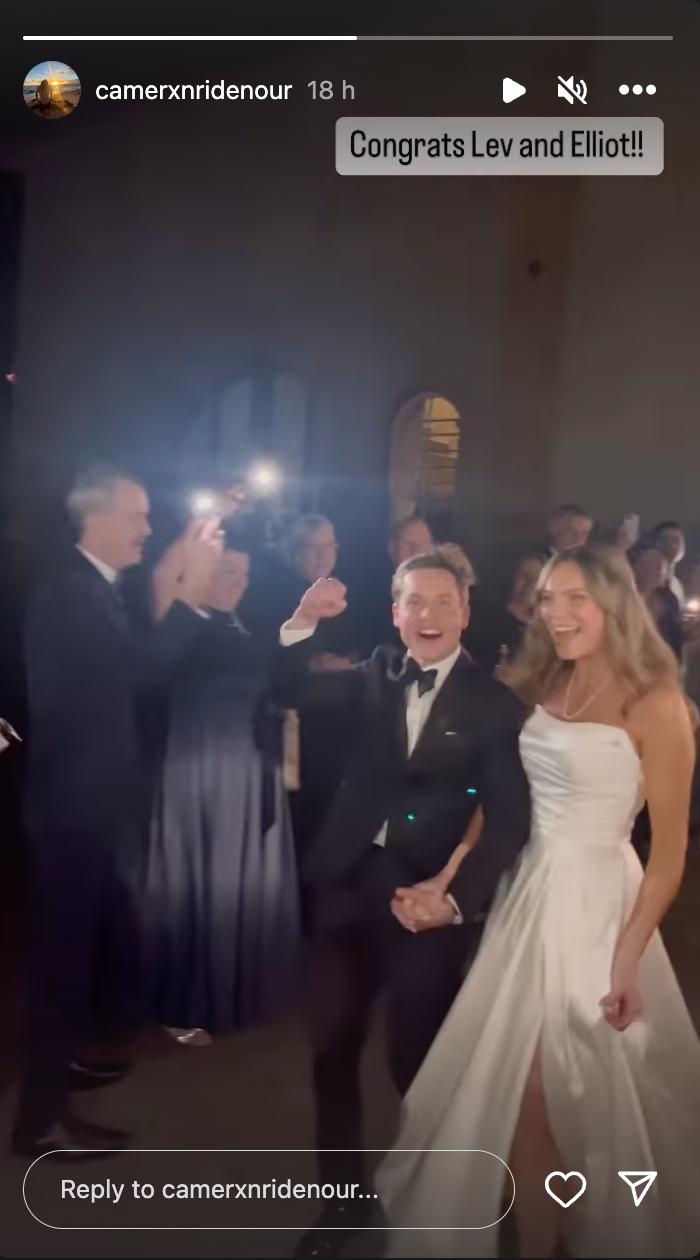 Lev and Elliott Bure during their wedding, dated January 2024 | Source: Instagram/camerxnridenour