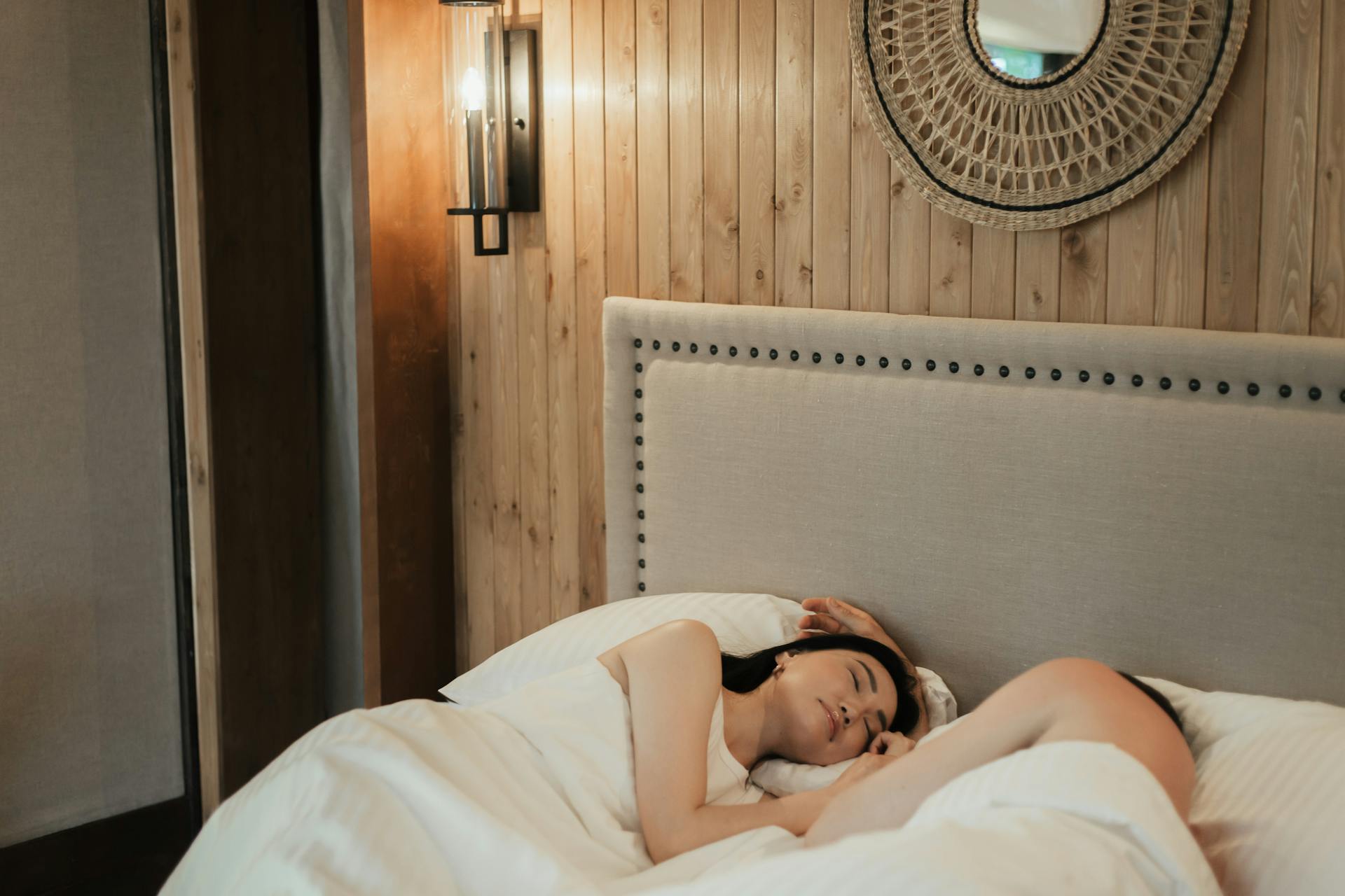 A couple sleeping in their bed | Source: Pexels