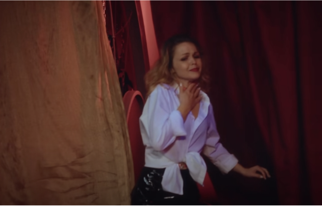 A woman runs away in tears | Source: Youtube/LOVEBUSTER