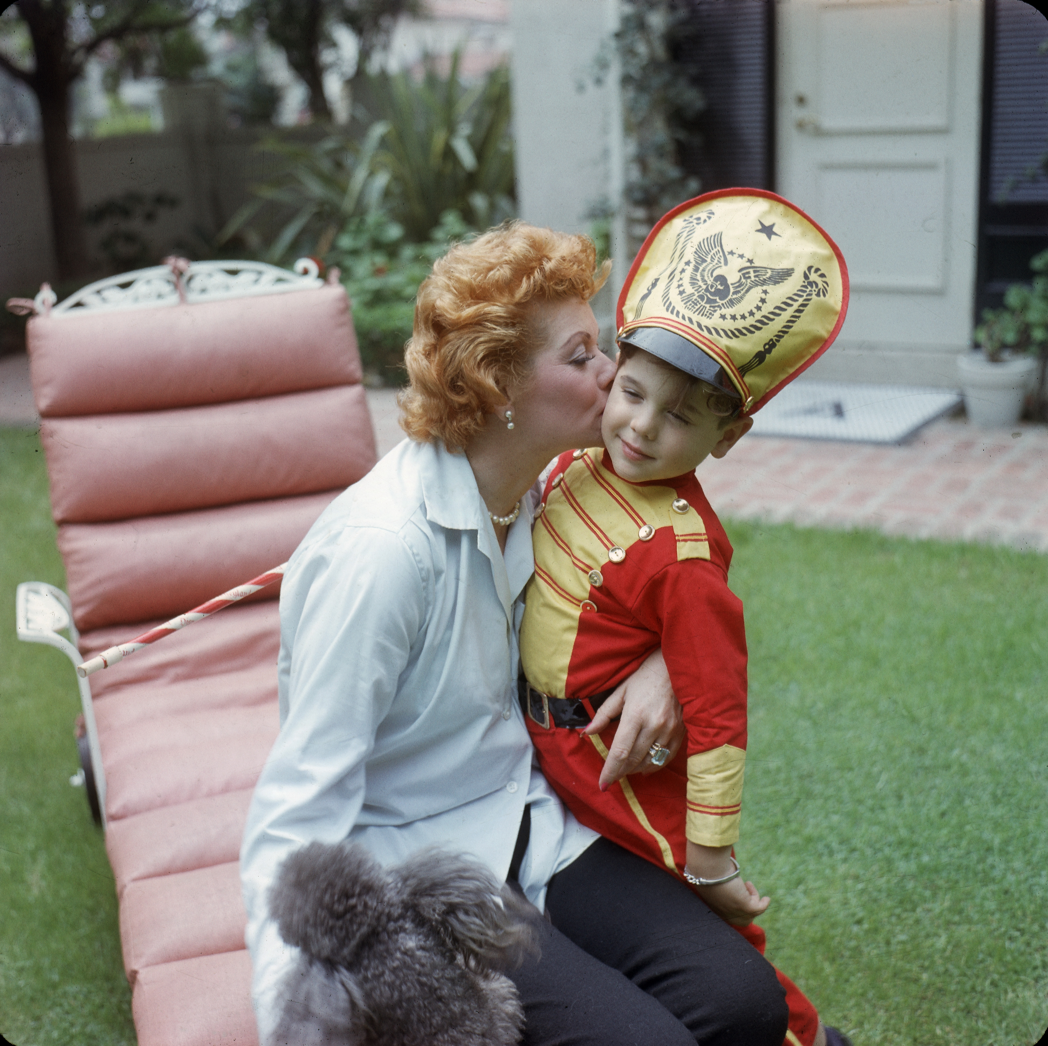 The child star and his famous mother in the back yard of their home, in Los Angeles, California, in 1957 | Source: Getty Images