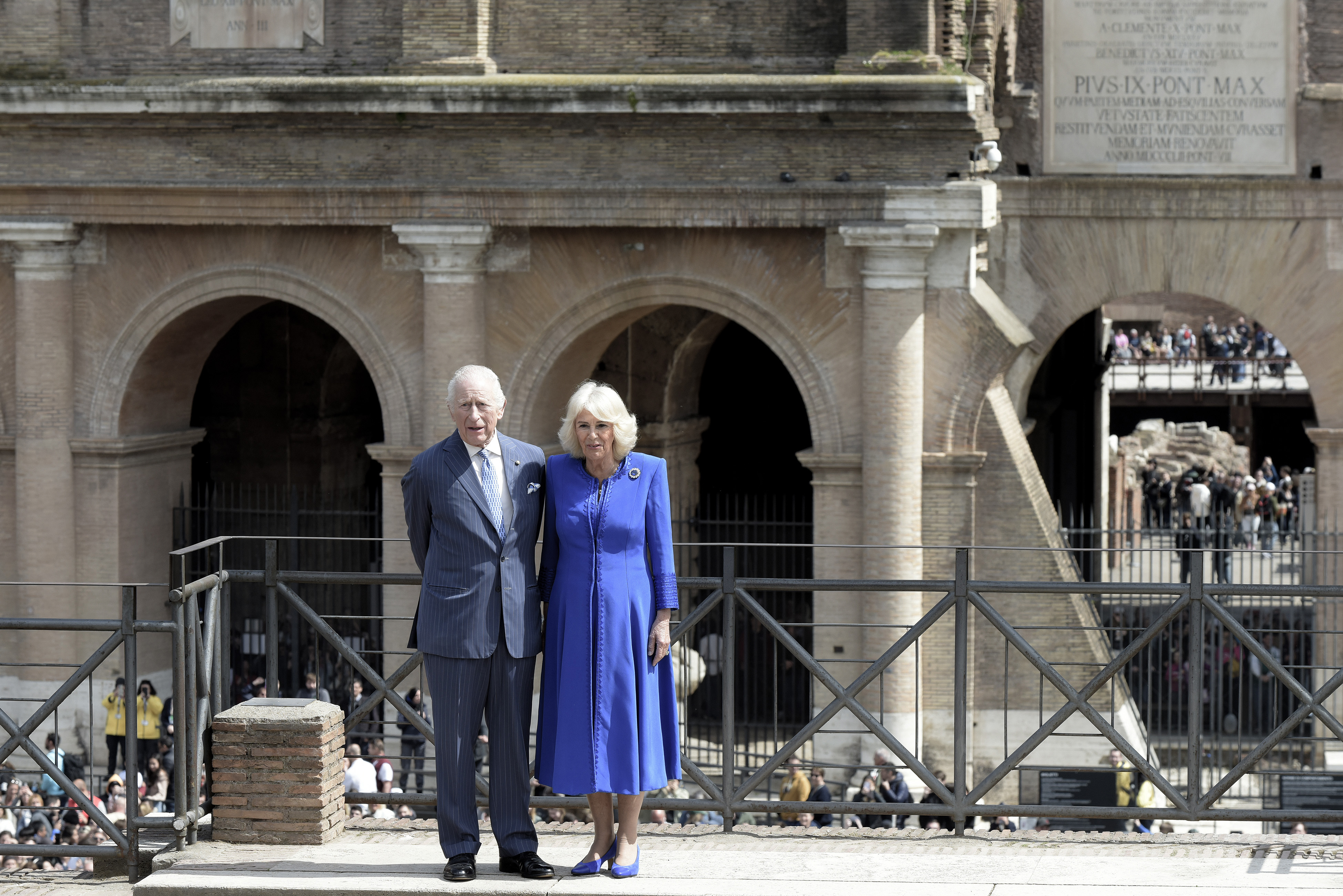 Against the timeless stone arches of the Colosseum, the King and Queen pose side by side. The Roman amphitheatre behind them evokes centuries of history, adding gravity to the moment. The image speaks volumes about the symbolic weight of their visit to one of Europe's most iconic landmarks.