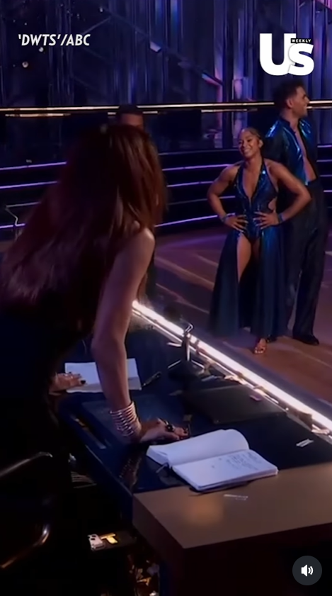 The moment Carrie Ann Inaba stood from her seat to fire back at the audience, as seen from a video post dated November 26, 2025. | Source: Instagram Reel/usweekly